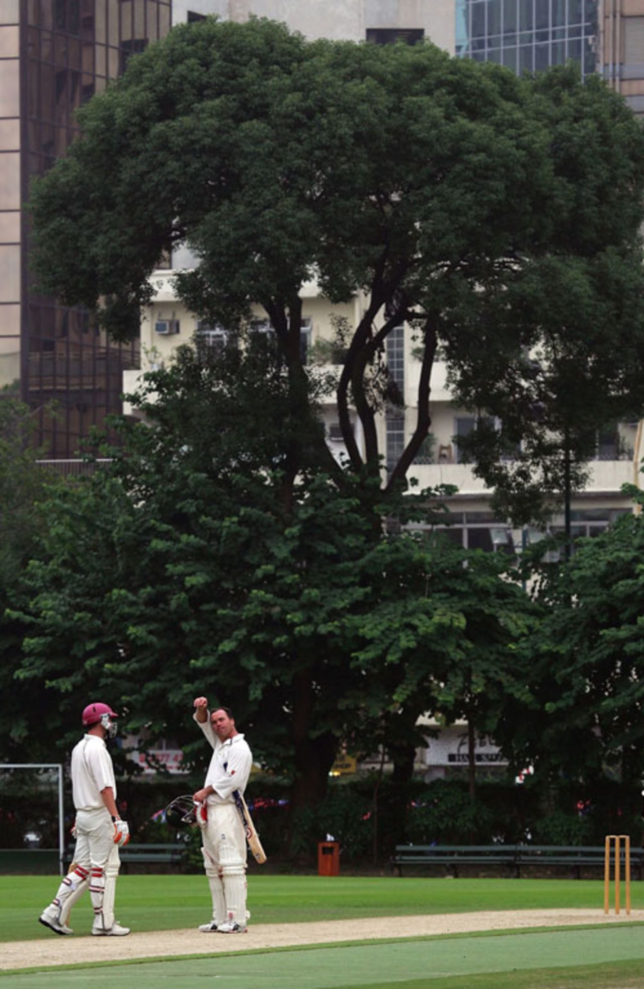 MCC batsmen take a breather during a match between MCC and Hong Kong Cricket Association,  Kowloon Cricket Club, Hong Kong, October 8, 2006