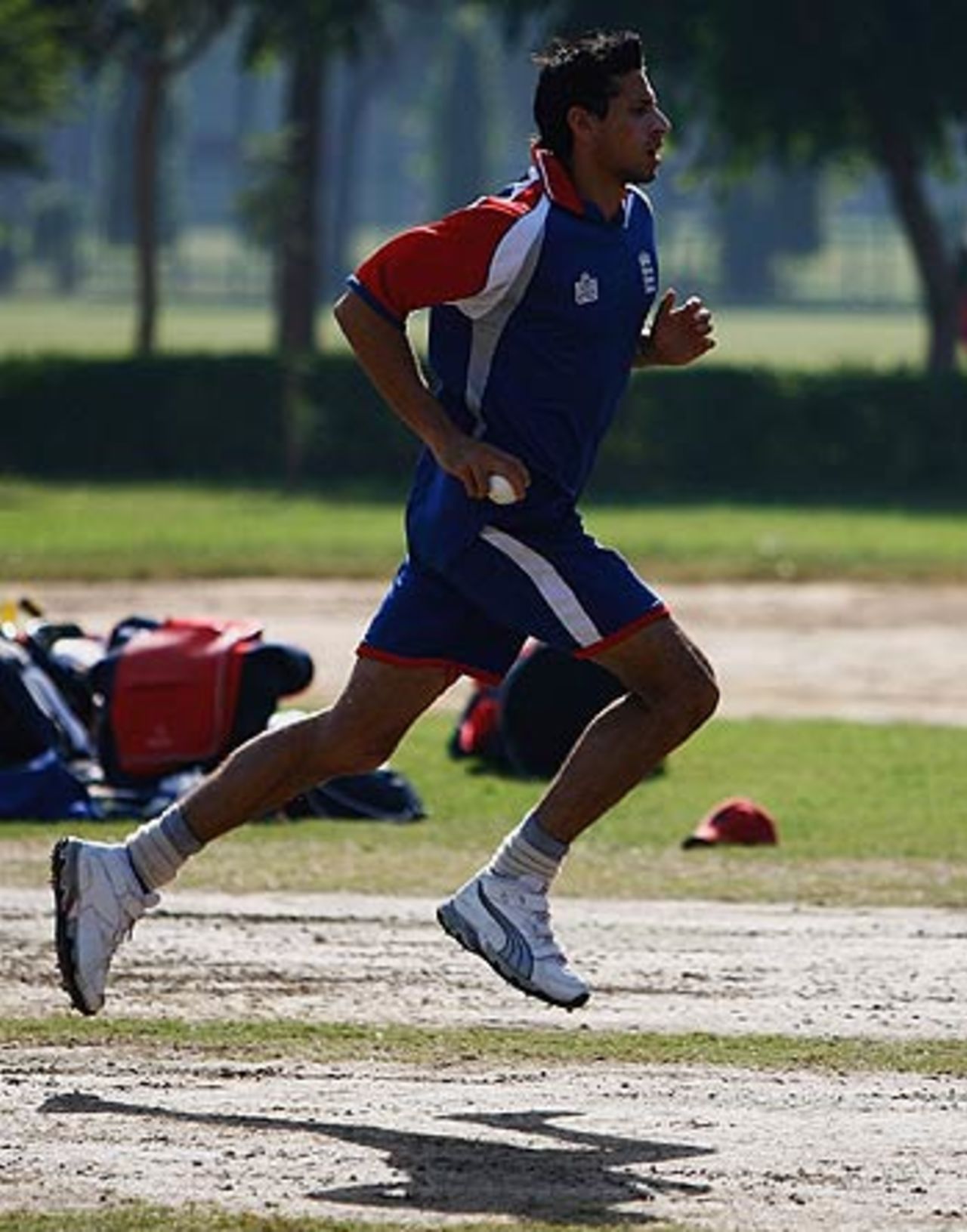 Sajid Mahmood runs in to bowl at England's practice session, in New Delhi, October 10, 2006