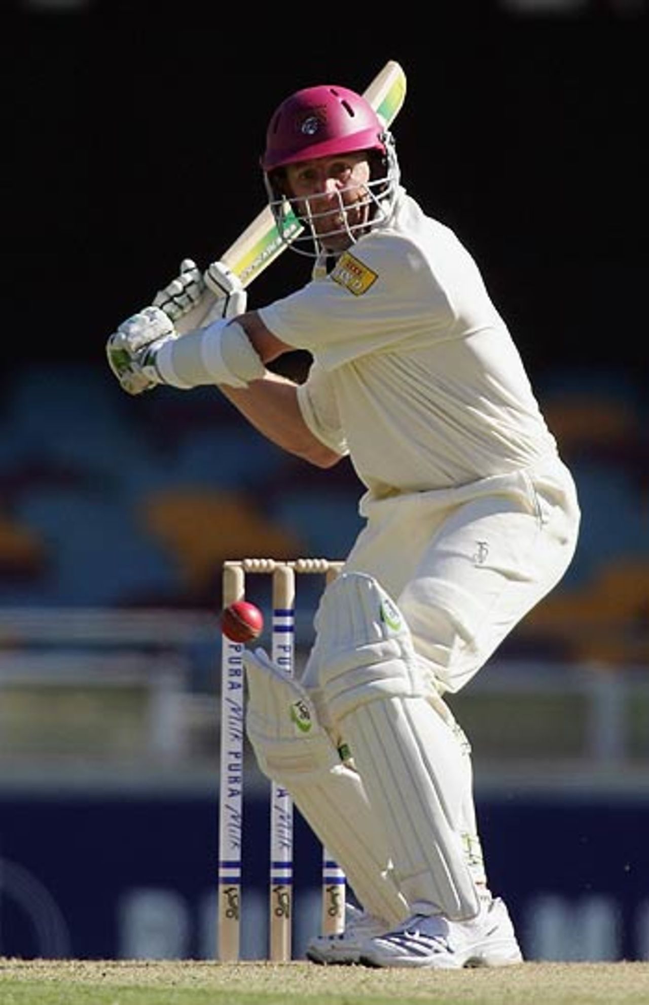 Clinton Perren hits out en route to his 82, Queensland v Tasmania, Pura Cup, 1st day, Brisbane, October 13, 2006