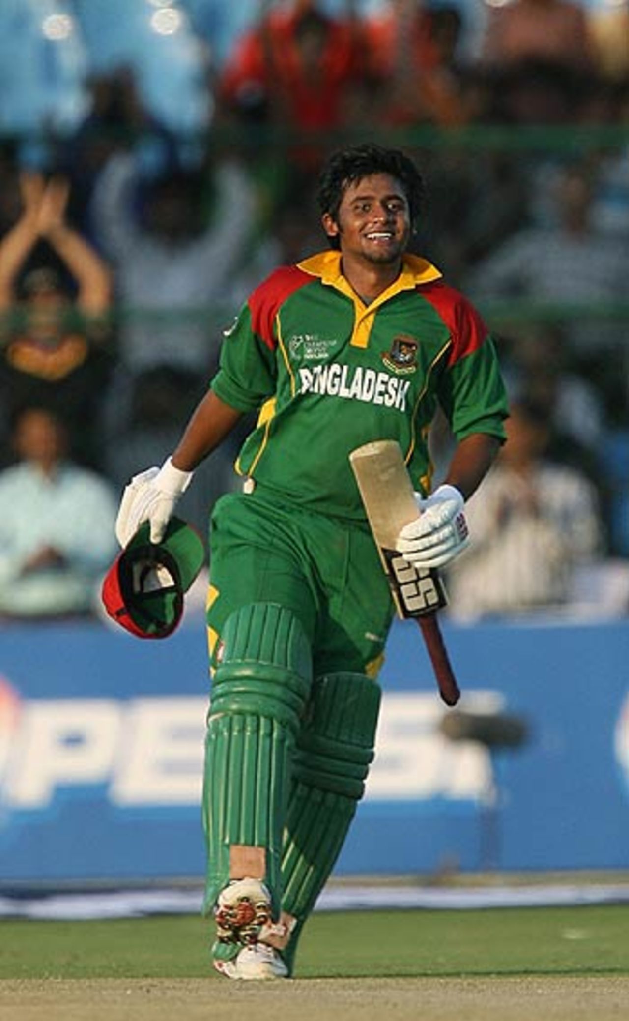 An elated Shahriar Nafees after reaching his century, Bangladesh v Zimbabwe, Champions Trophy, Jaipur, October 13, 2006