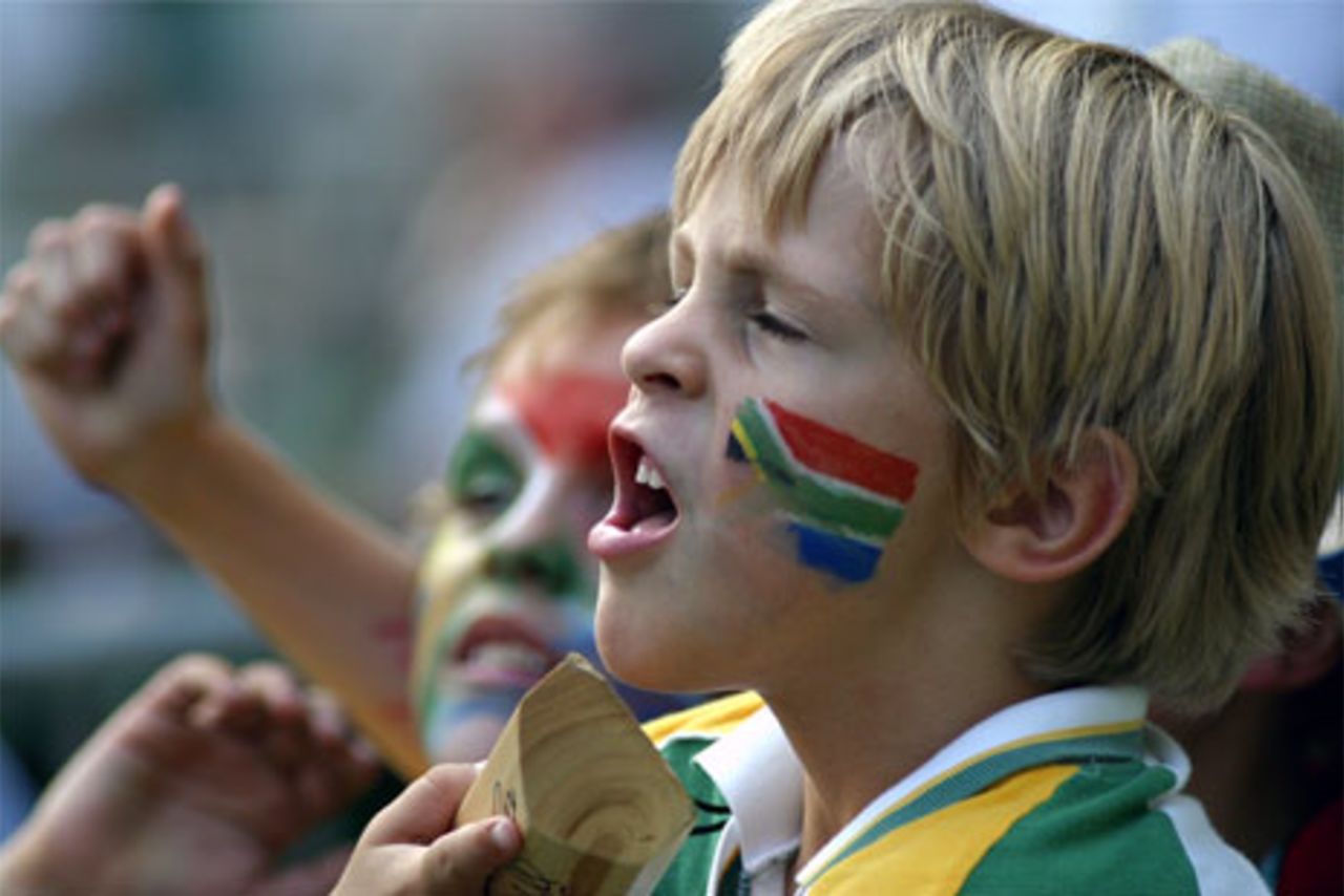 Young South African fans cheer for their team at the 2003 Cathay Pacific / Standard Chartered Hong Kong International Cricket Sixes