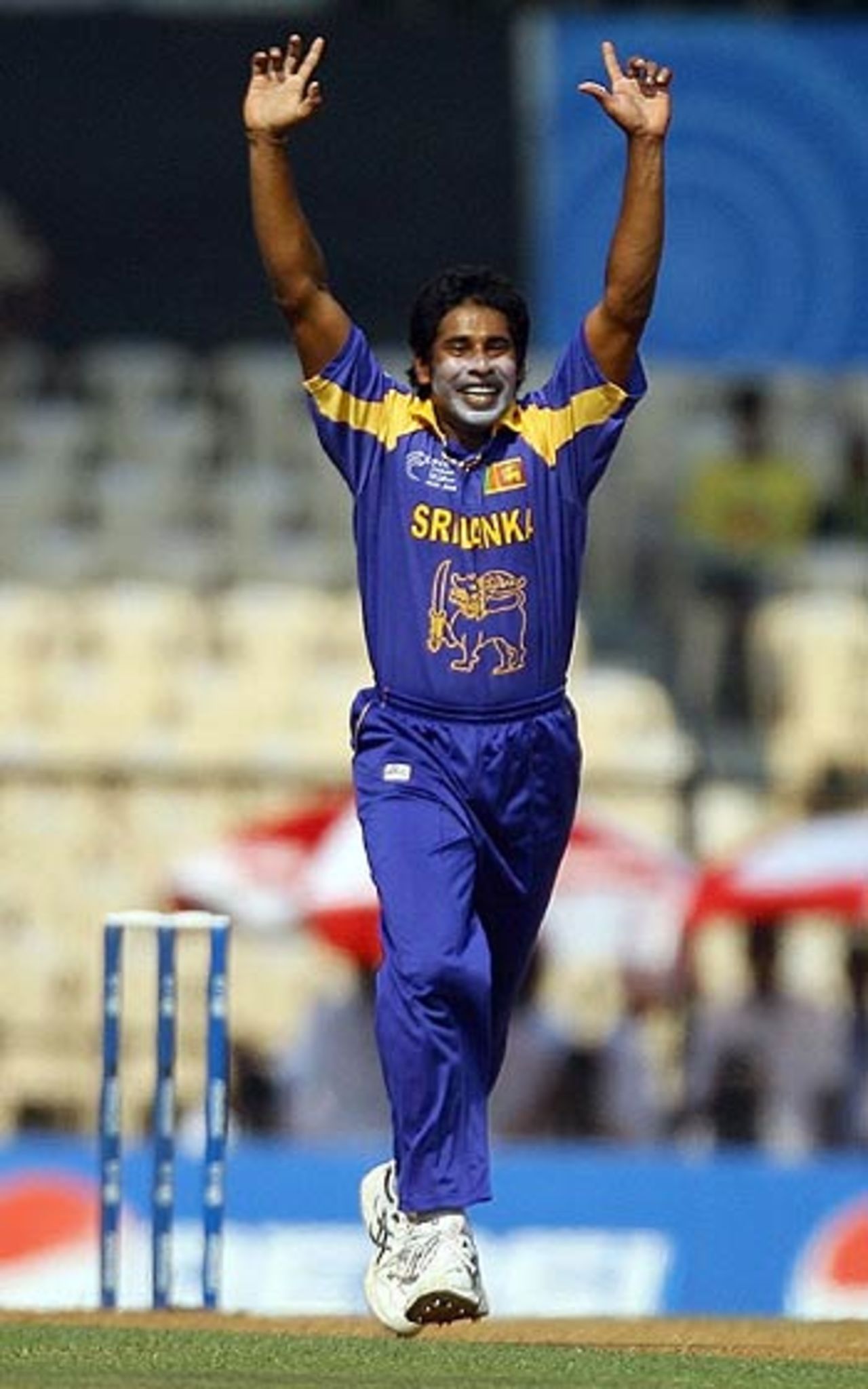 Chaminda Vaas celebrates after taking Chris Gayle's wicket for a duck, Sri Lanka v West Indies, 6th qualifying match, Champions Trophy, Mumbai, October 14, 2006