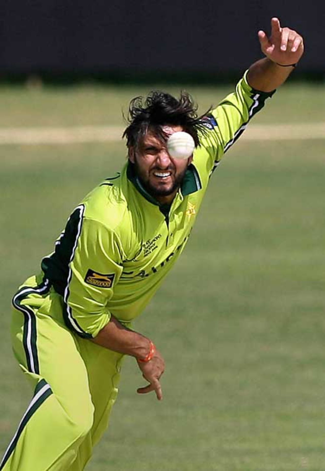 Shahid Afridi spins out a legbreak, Rajasthan XI v Pakistanis, Jaipur, October 14, 2006