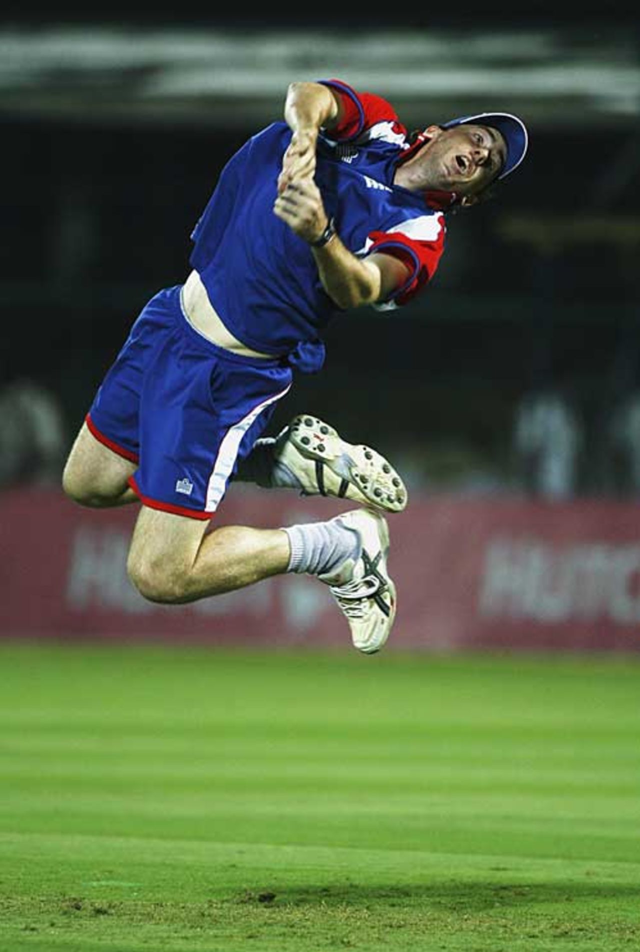 Rikki Clarke throws himself skywards during England's training session under the lights, Jaipur, October 14, 2006