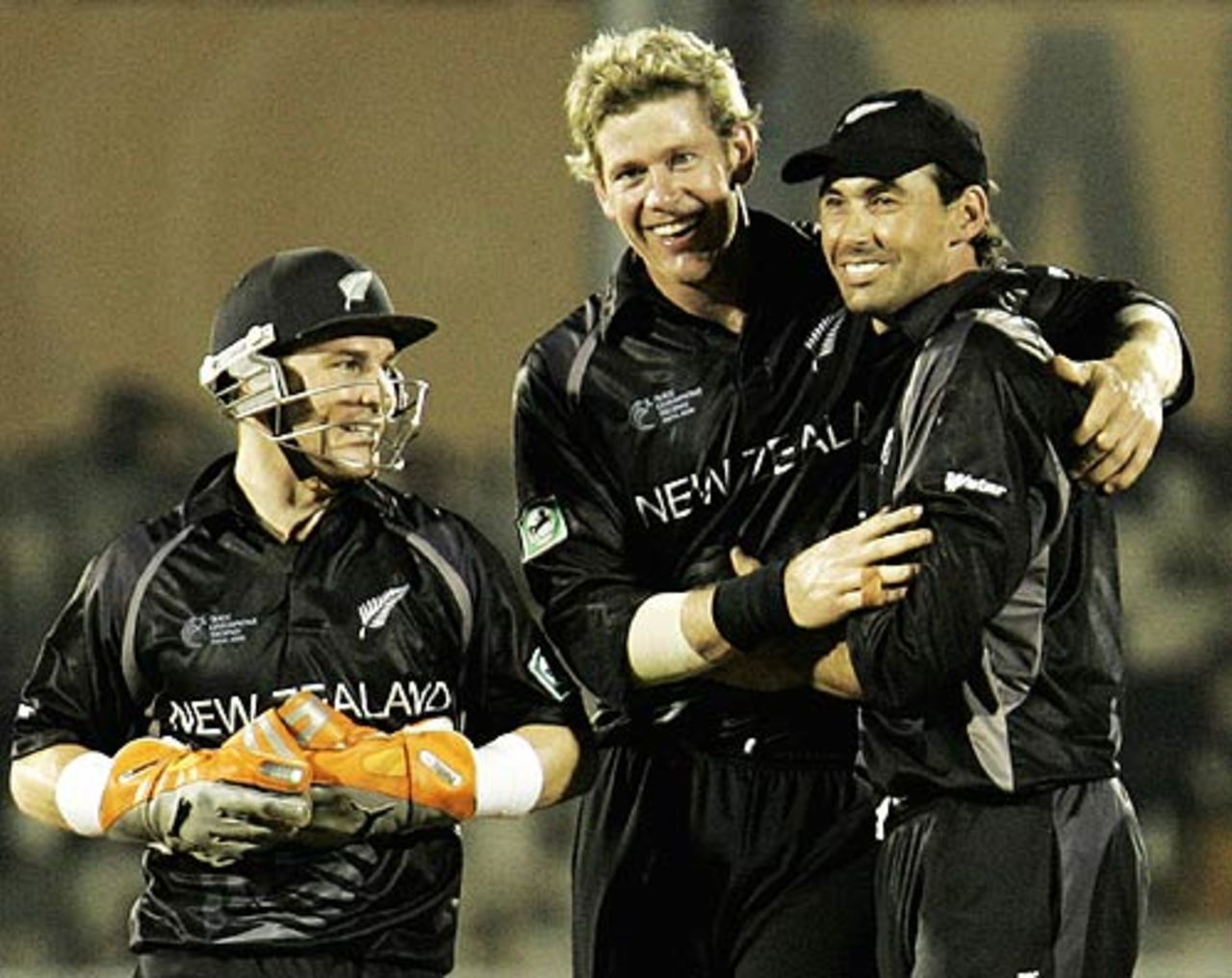 Jacob Oram pleases his captain, Stephen Fleming, with another scalp as Brendon McCullum looks on, New Zealand v South Africa, 2nd Match, Champions Trophy, Mumbai, October 16, 2006