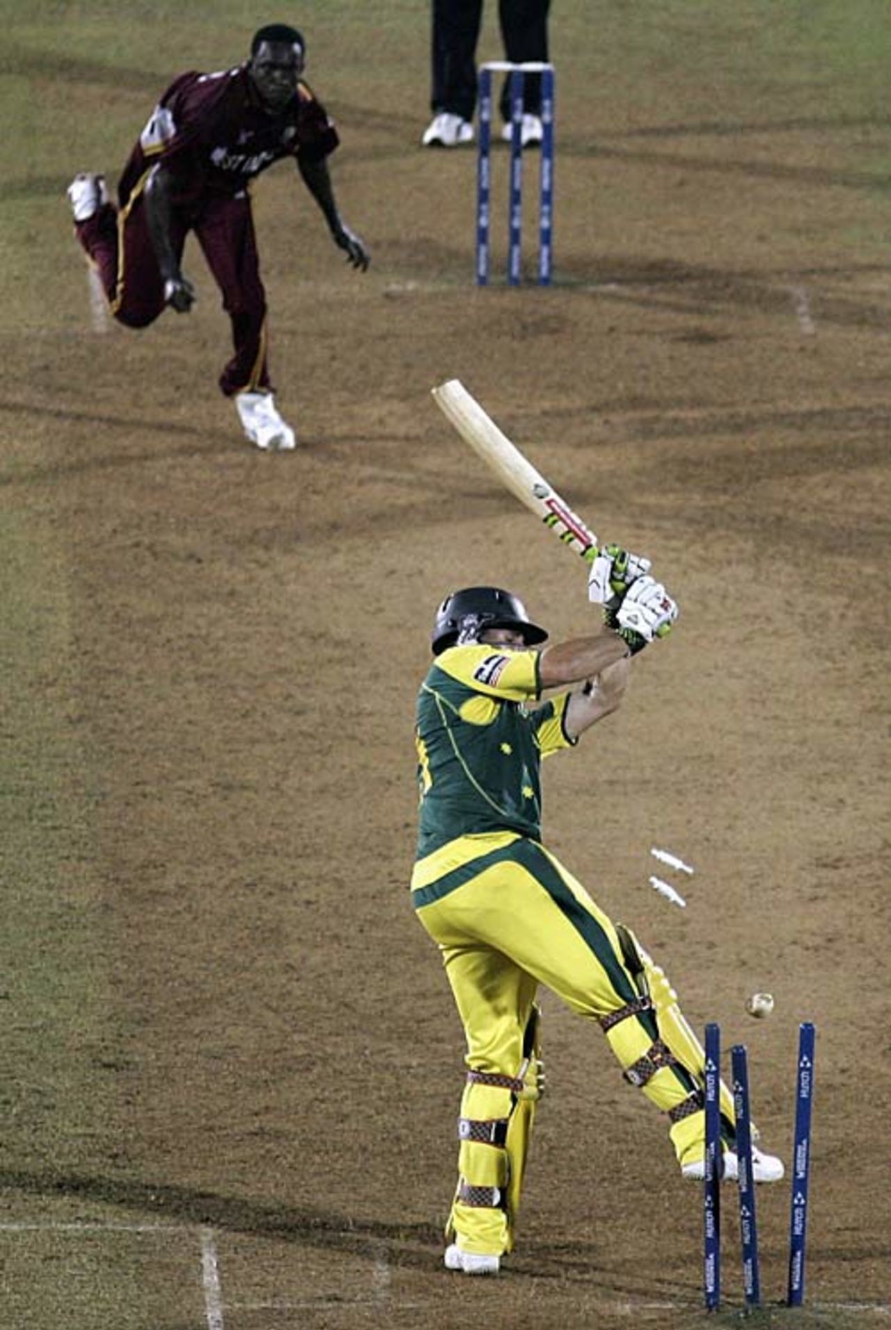 Brad Hogg is bowled by Jerome Taylor, Australia v West Indies, 4th match, Mumbai, October 18, 2006