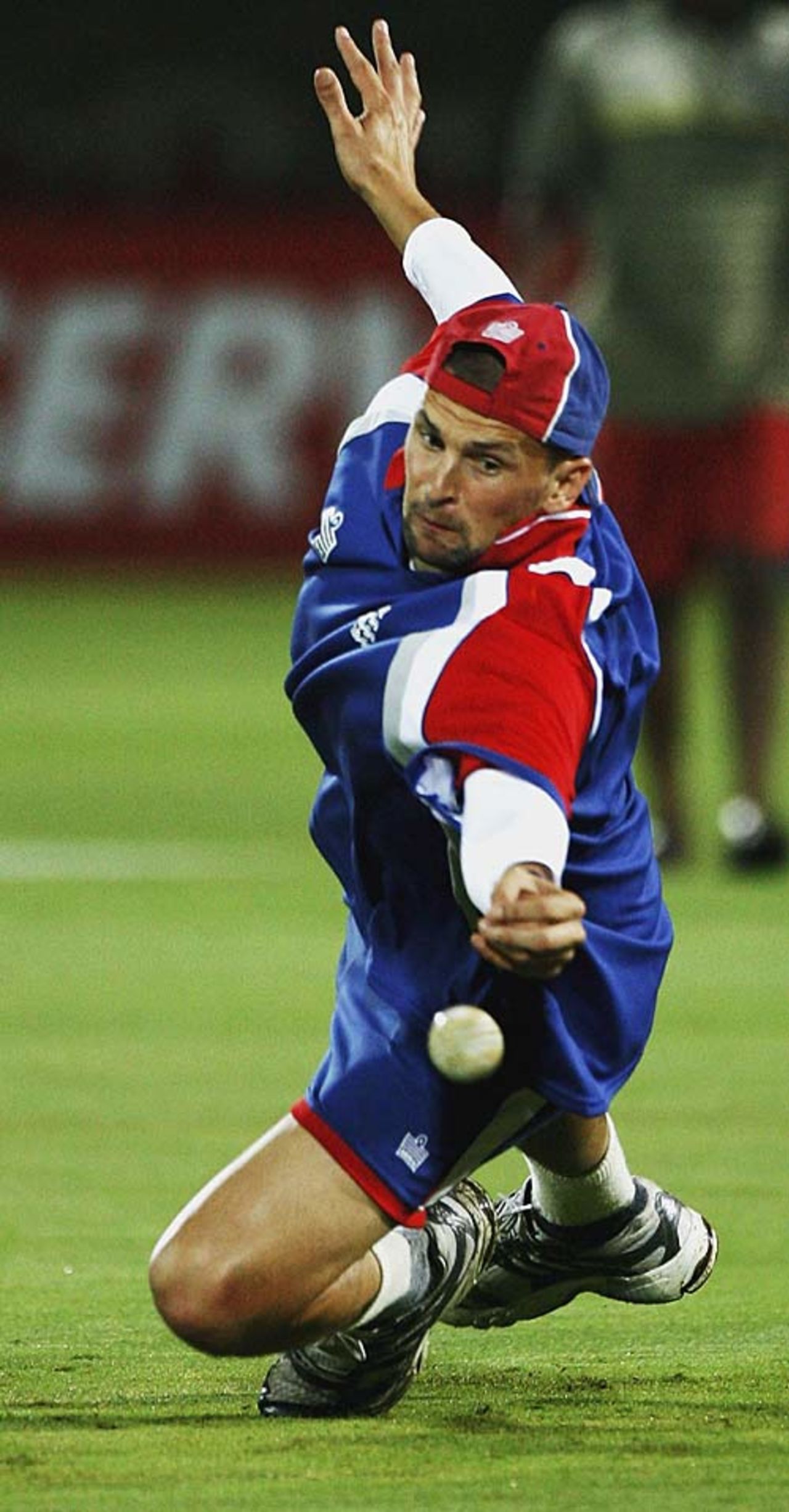 Steve Harmison dives to stop a ball during a training session, Jaipur, October 20, 2006