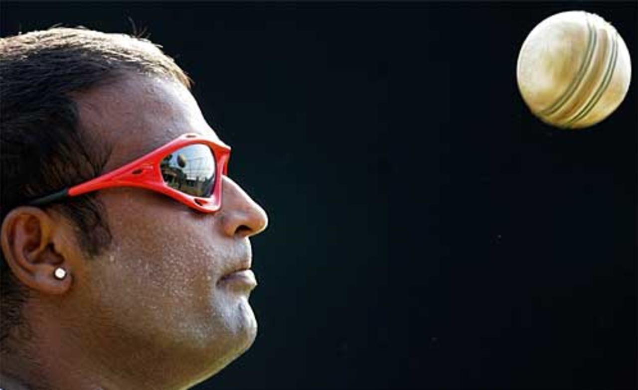 Ramesh Powar ponders during practice at the Sardar Patel Stadium in Ahmedabad ahead of their match against West Indies, 22 October 2006