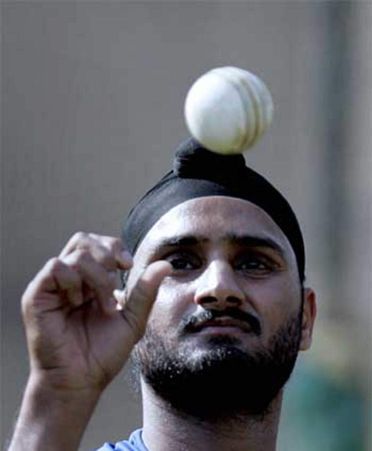 Harbhajah Singh twirls up during practice at the Sardar Patel Stadium in Ahmedabad ahead of their match against West Indies, 22 October 2006