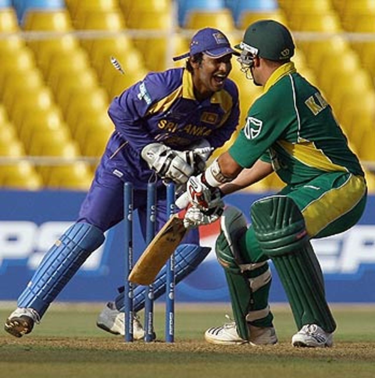 Jacques Kallis strays out of his crease and Kumar Sangakkara does the rest, South Africa v Sri Lanka, 7th match, Champions Trophy, Ahmedabad, October 24, 2006