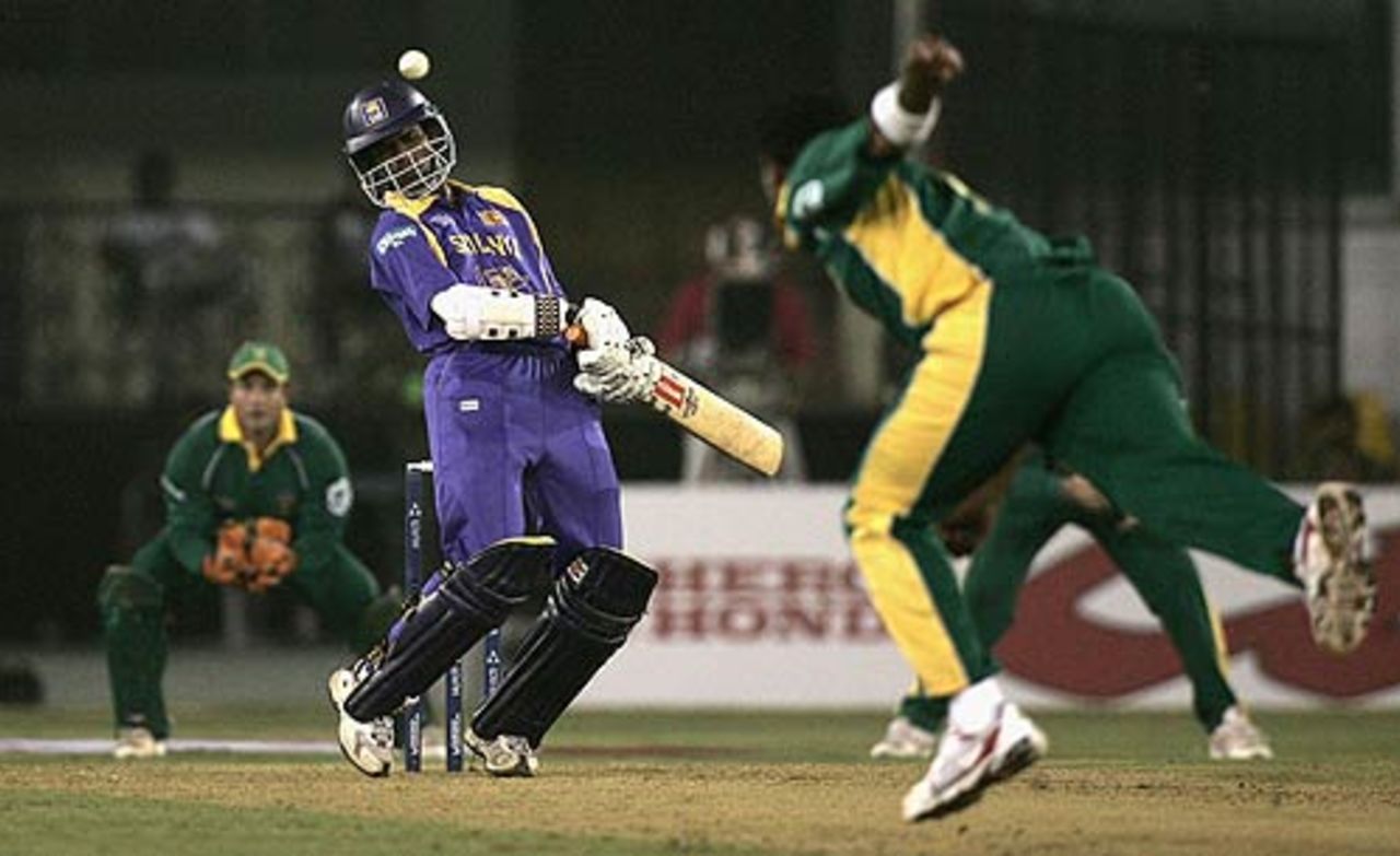 Upul Tharanga gets a lifter from Makhaya Ntini, South Africa v Sri Lanka, 7th match, Champions Trophy, Ahmedabad, October 24, 2006