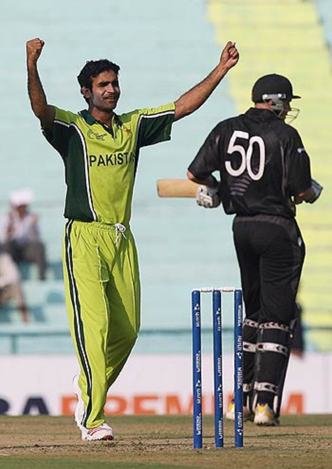 Rao Iftikhar Anjum chips in with the wicket of Peter Fulton, New Zealand v Pakistan, 8th match, Mohali, Champions Trophy, October 25, 2006
