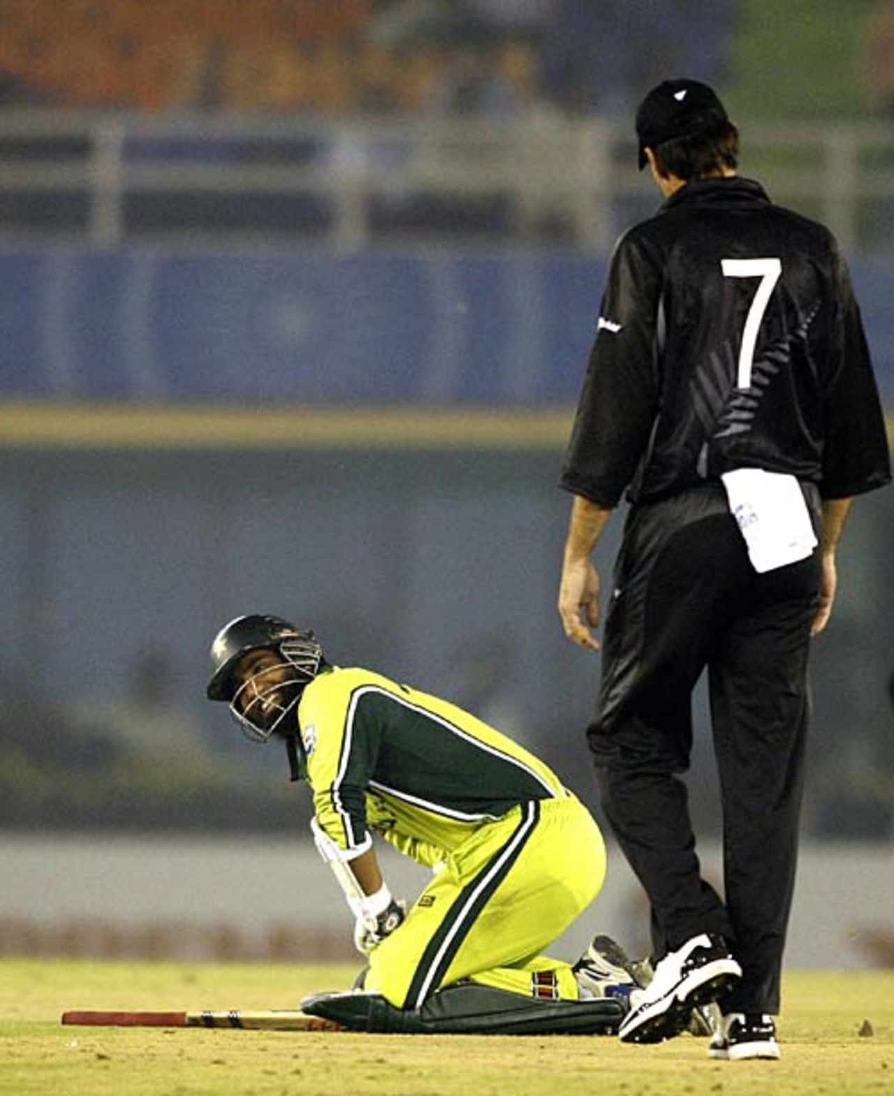 Cor, that's gotta hurt: Mohammad Yousuf manages to smile after being hit between the knee-rolls, New Zealand v Pakistan, 8th match, Mohali, Champions Trophy, October 25, 2006