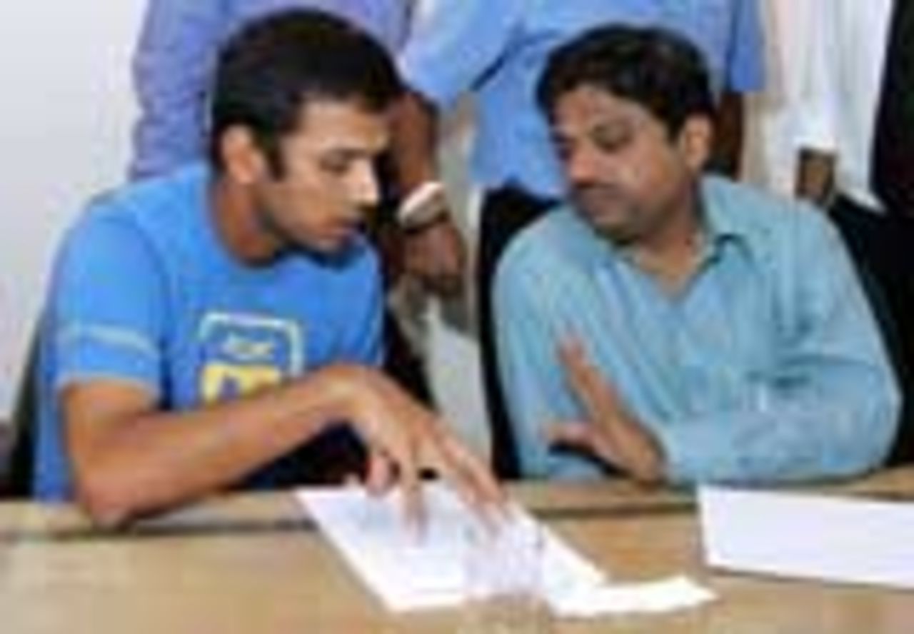 The Indian board's Chief Administrative Officer, Professor Ratnakar Shetty with Rahul Dravid at a selection meeting