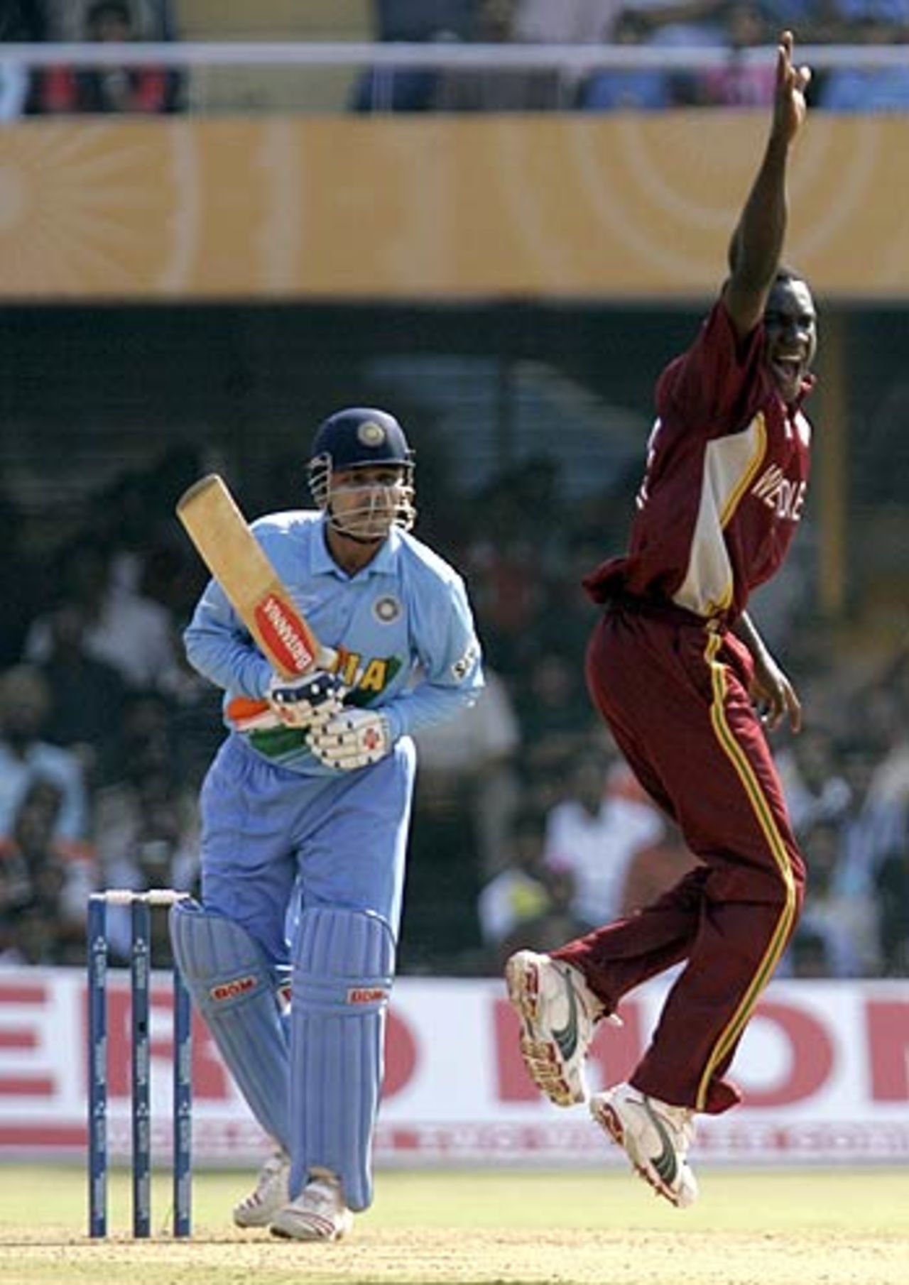 Jerome Taylor wins a confident appeal against Virender Sehwag, India v West Indies, 9th match, Champions Trophy, Ahmedabad, October 26, 2006