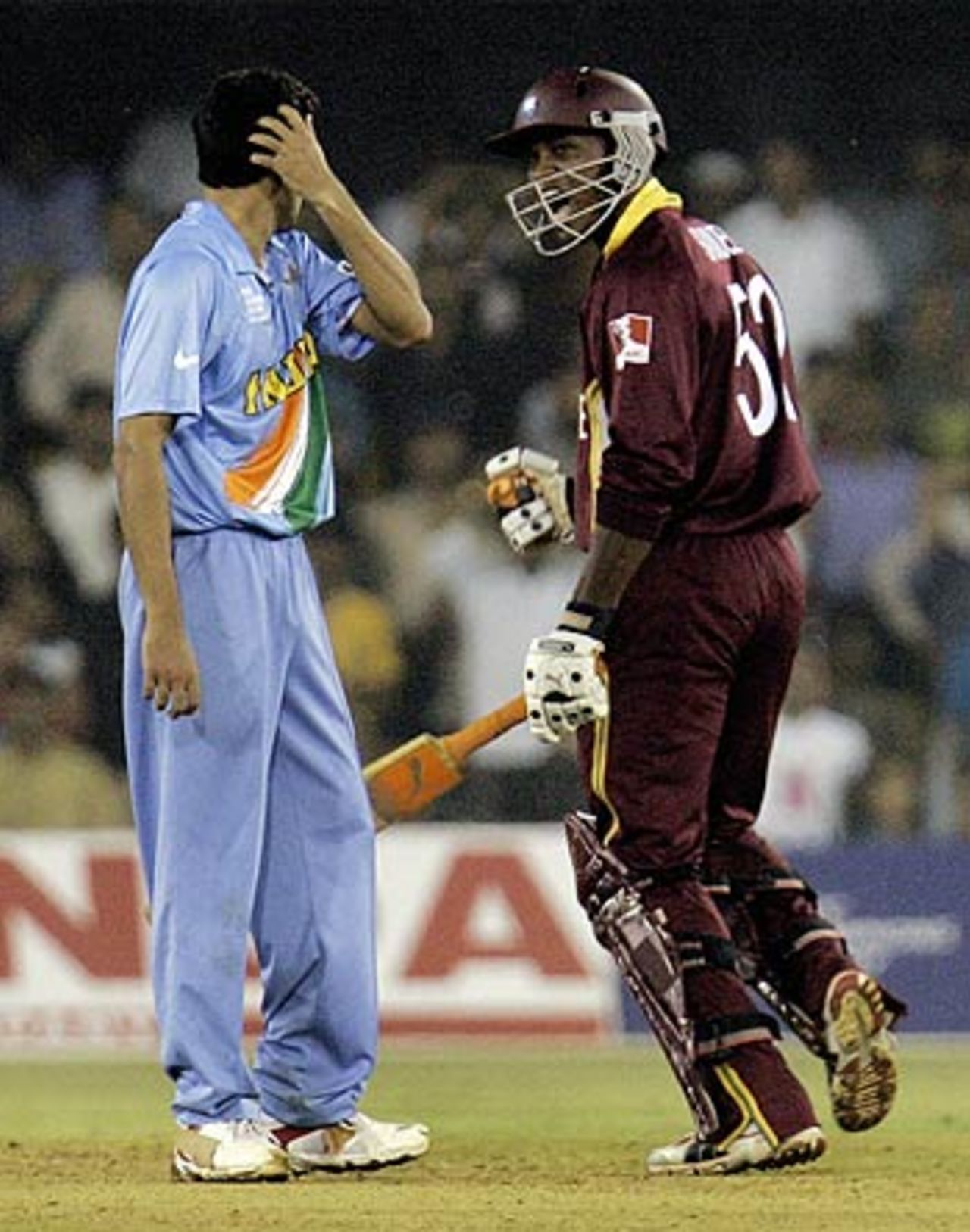 Marlon Samuels reacts after smashing the winning runs, India v West Indies, Champions Trophy, 9th match, Ahmedabad, October 26, 2007