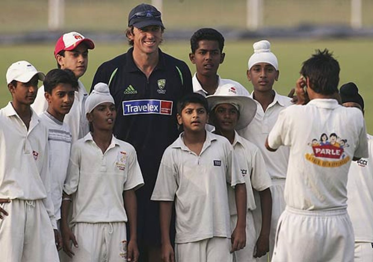 Youngsters get a photo opportunity with Glenn McGrath, Chandigarh, October 27, 2006