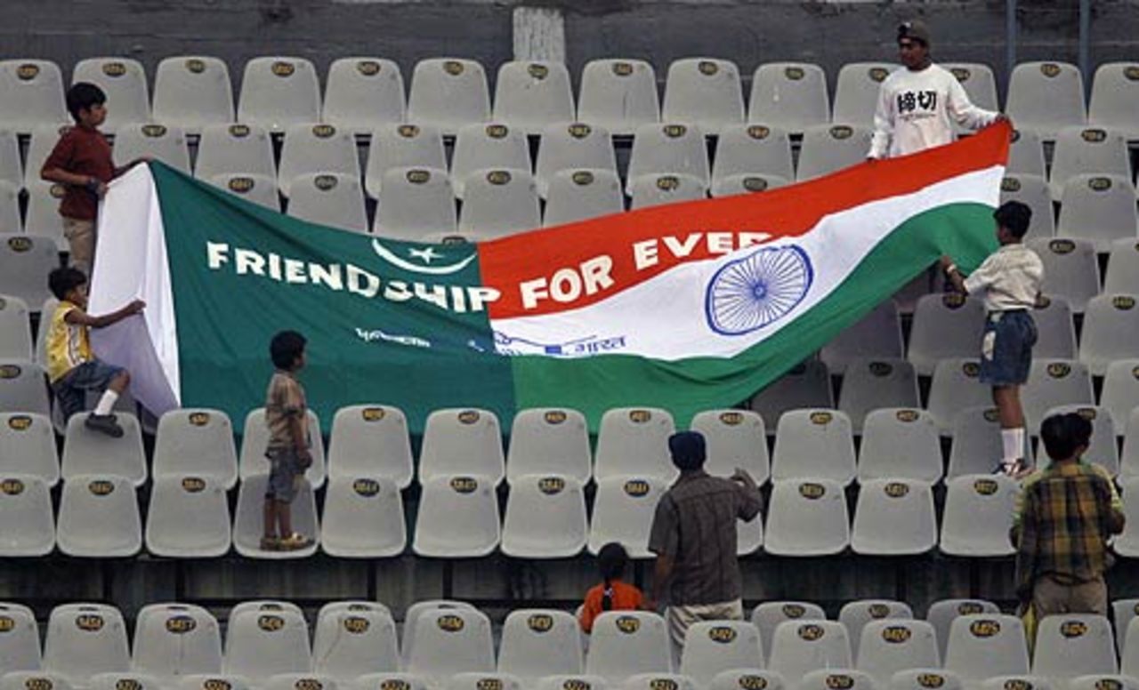 Fans display Indian and Pakistan flags stitched together with the words 'Friendship forever' printed on it, Pakistan v South Africa, Champions Trophy, 16th match, Mohali, October 27, 2006