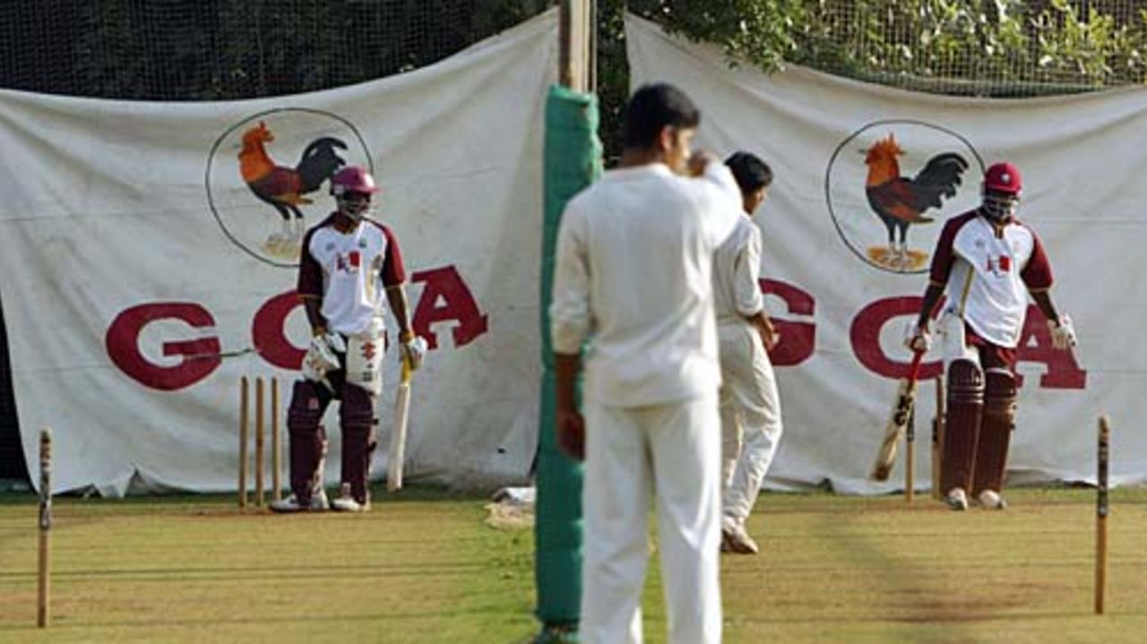 Dwayne Smith and Wavell Hinds wait for their next deliveries in the nets ahead of West Indies' match against England tomorrow, Ahmedabad, October 27, 2006