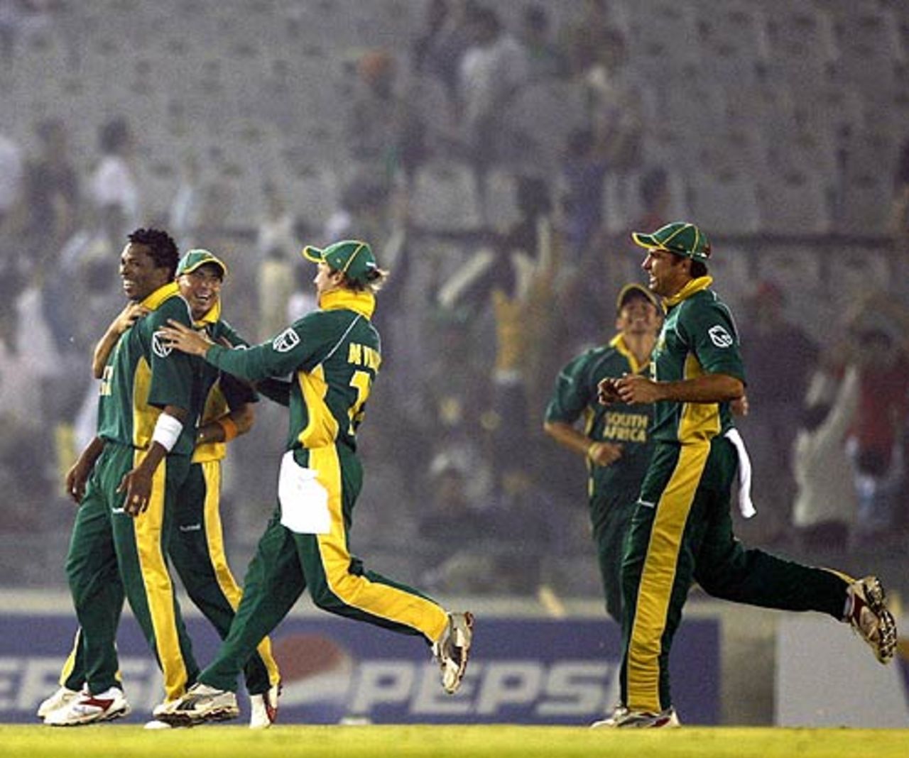 The South Africans mob Makhaya Ntini who destroyed Pakistan's top order, Champions Trophy, 16th match, Mohali, October 27, 2006