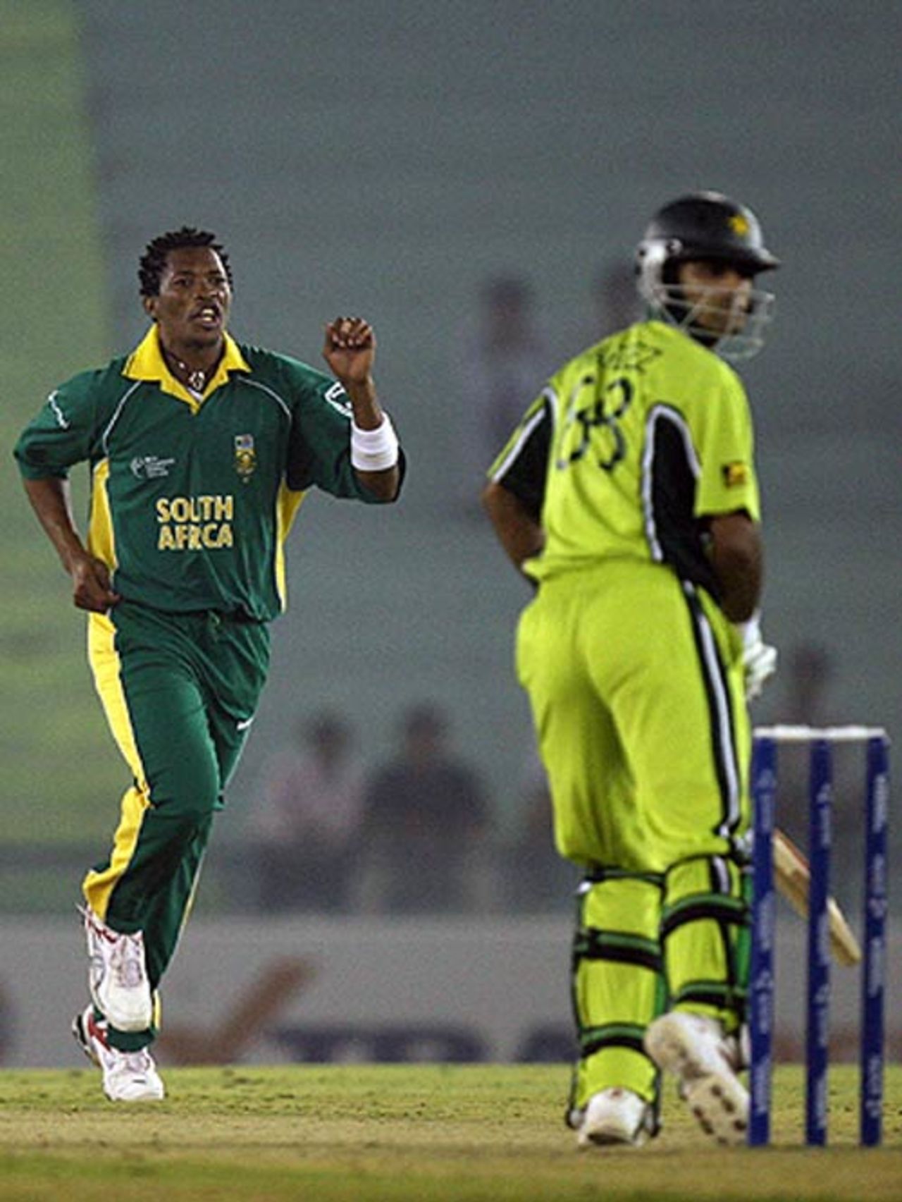 Makhaya Ntini celebrates after taking Mohammad Hafeez's wicket from just his second ball, Pakistan v South Africa, Champions Trophy, Mohali, October 27, 2006