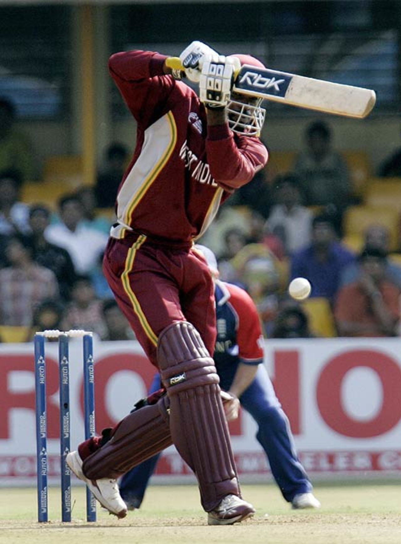 Chris Gayle drives powerfully down the ground, 17th match, Champions Trophy, Ahmedabad, October 28, 2006