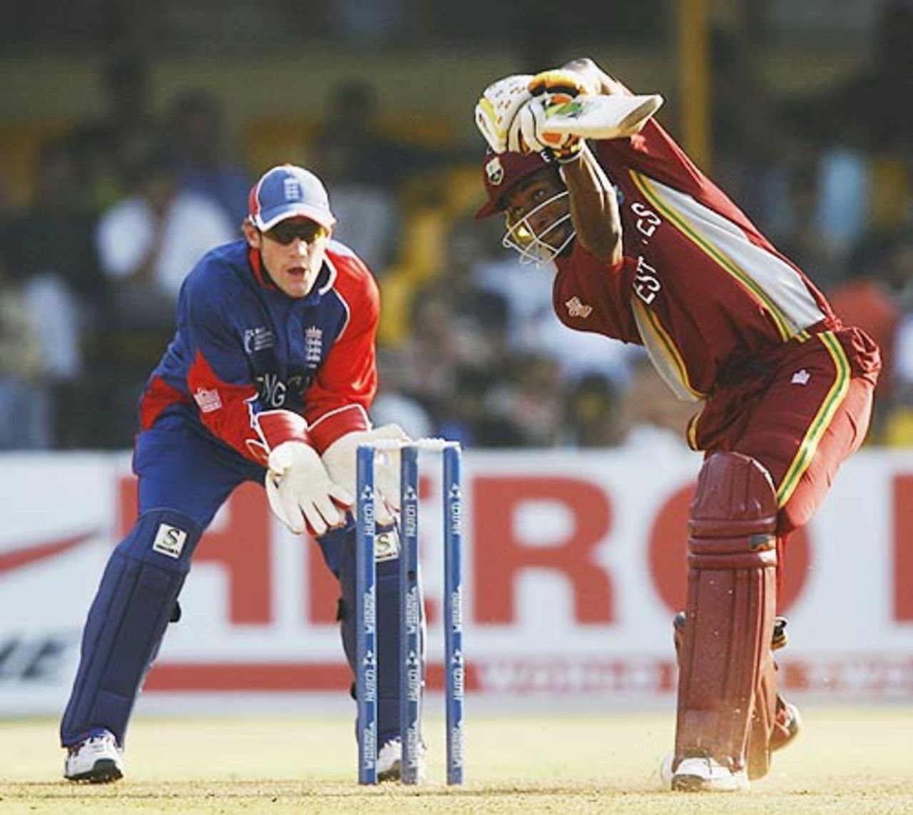 Chris Read can only watch as Dwayne Bravo drives through the off side, England v West Indies, 17th match, Champions Trophy, Ahmedabad, October 28, 2006