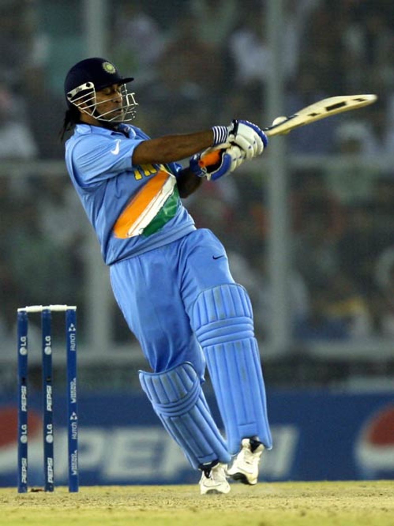 Eyes wide shut and thwack, Mahendra Singh Dhoni pulls, India v Australia, 18th match, Champions Trophy, October 29, 2007