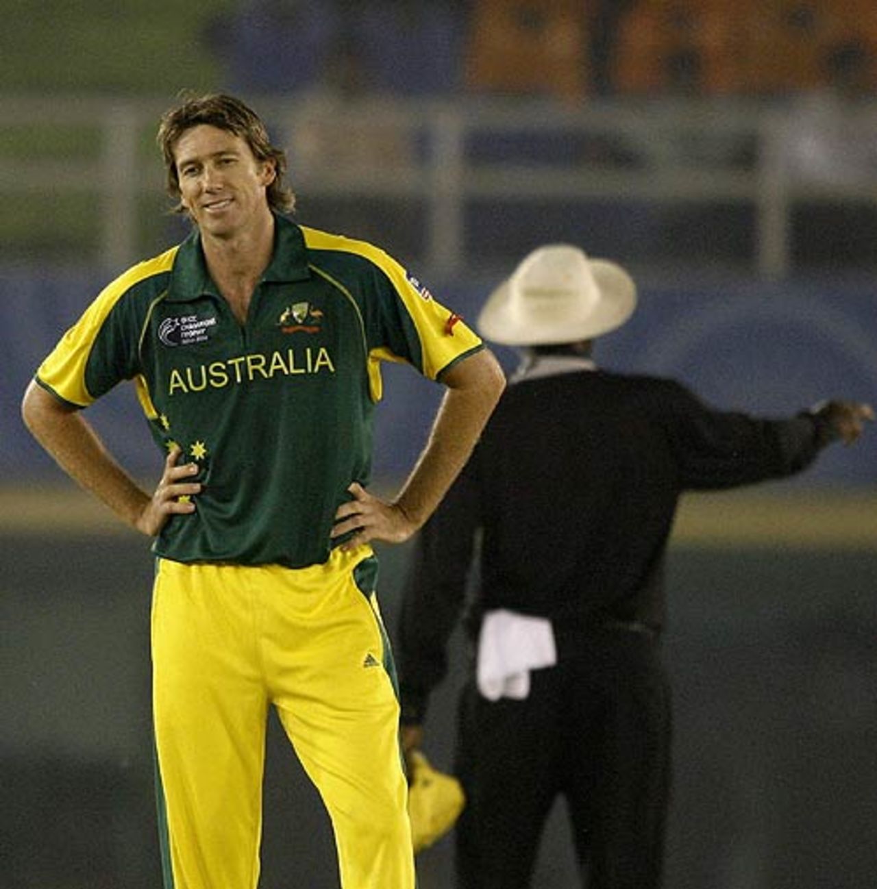 Glenn McGrath does his 'teapot' stance after conceding a boundary, Australia v New Zealand, 1st semi-final, Champions Trophy, Mohali, November 1, 2006