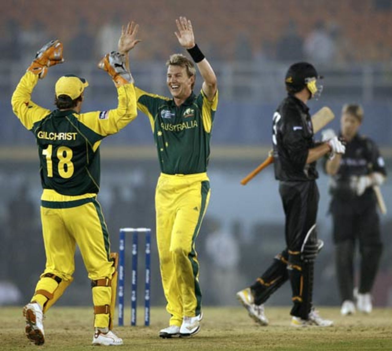 Brett Lee and Adam Gilchrist celebrate the fall of the last wicket, Australia v New Zealand, 1st semi-final, Champions Trophy, Mohali, November 1, 2006