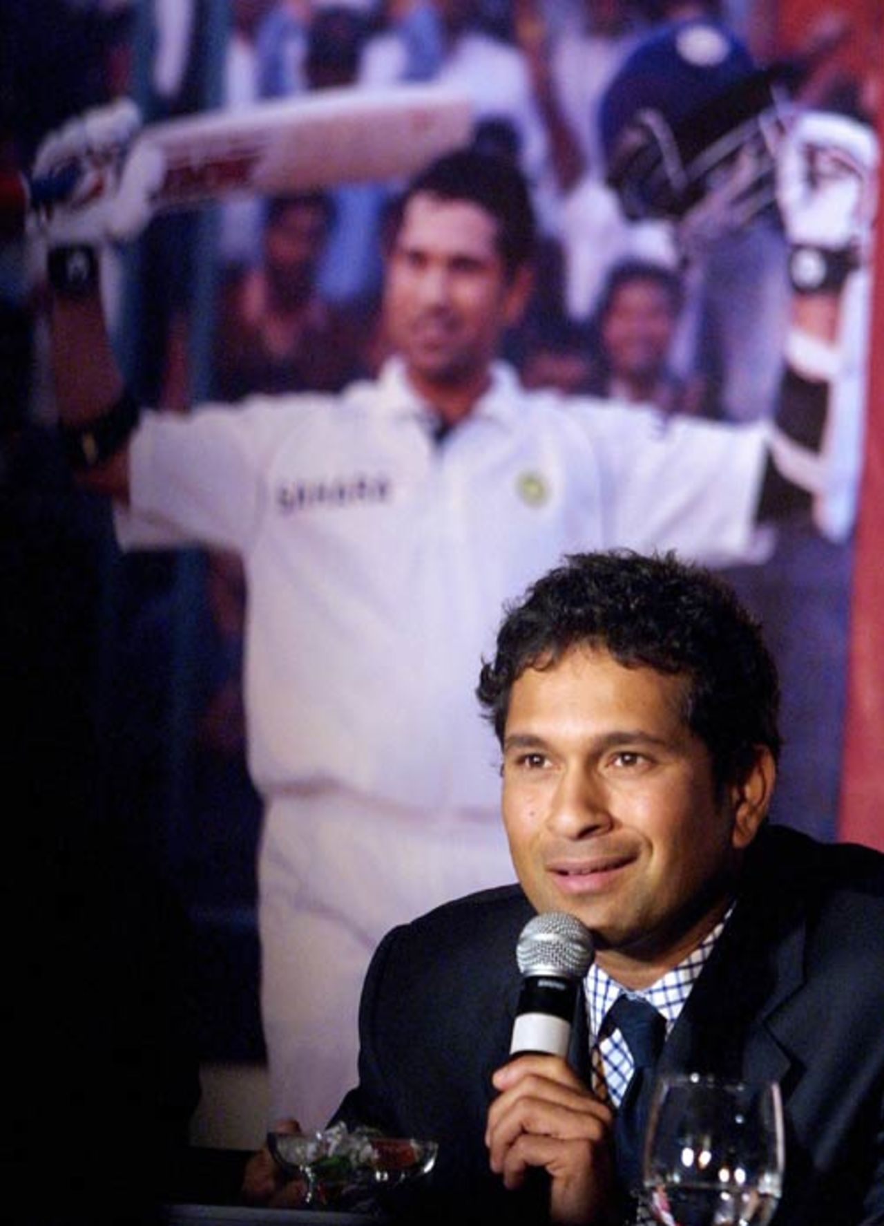 Sachin Tendulkar addresses the media after he was named the new brand ambassador for 'Canon India' in Mumbai, November 6, 2006