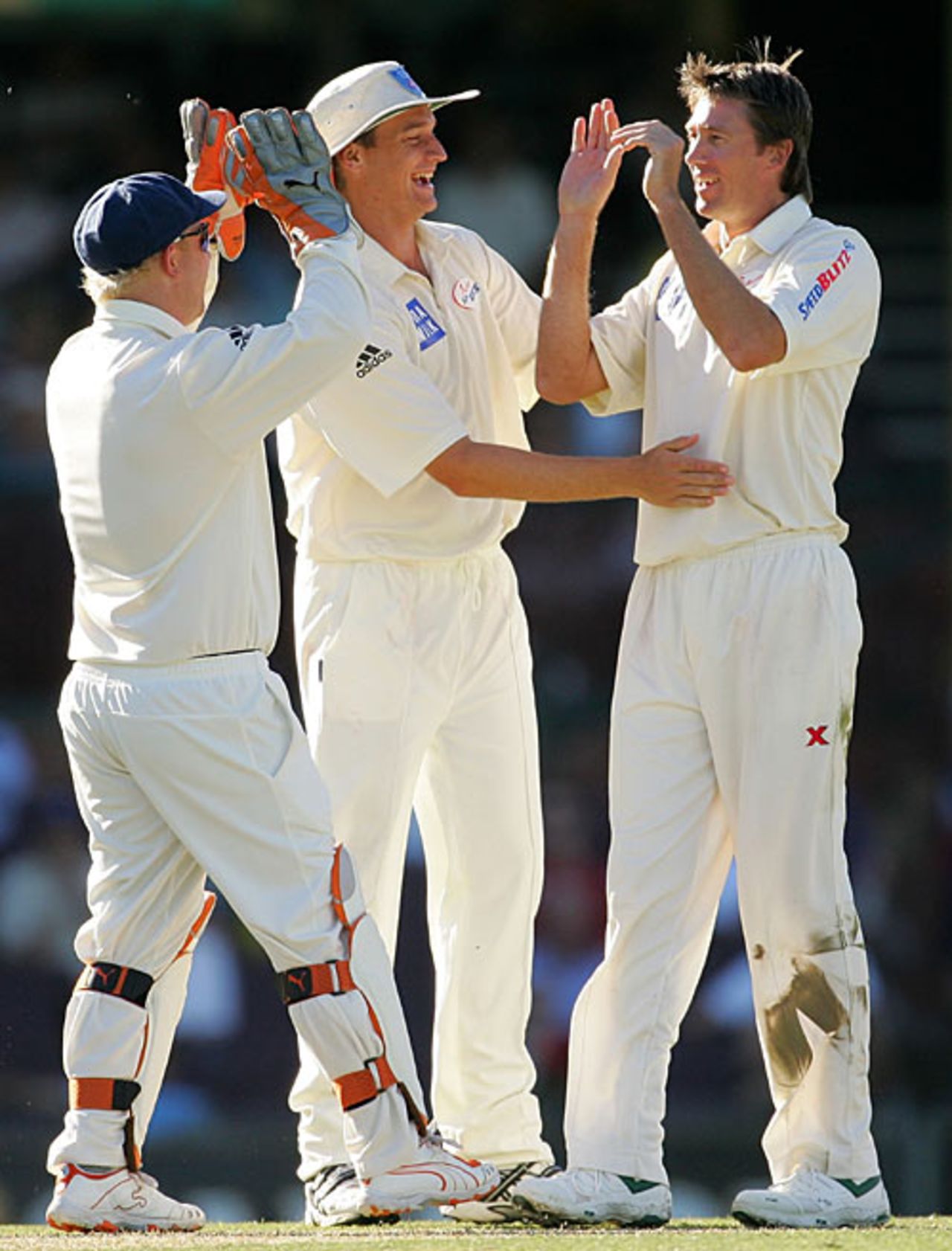 Glenn McGrath is congratulated on removing Alastair Cook, New South Wales v England, Sydney, November 13, 2006