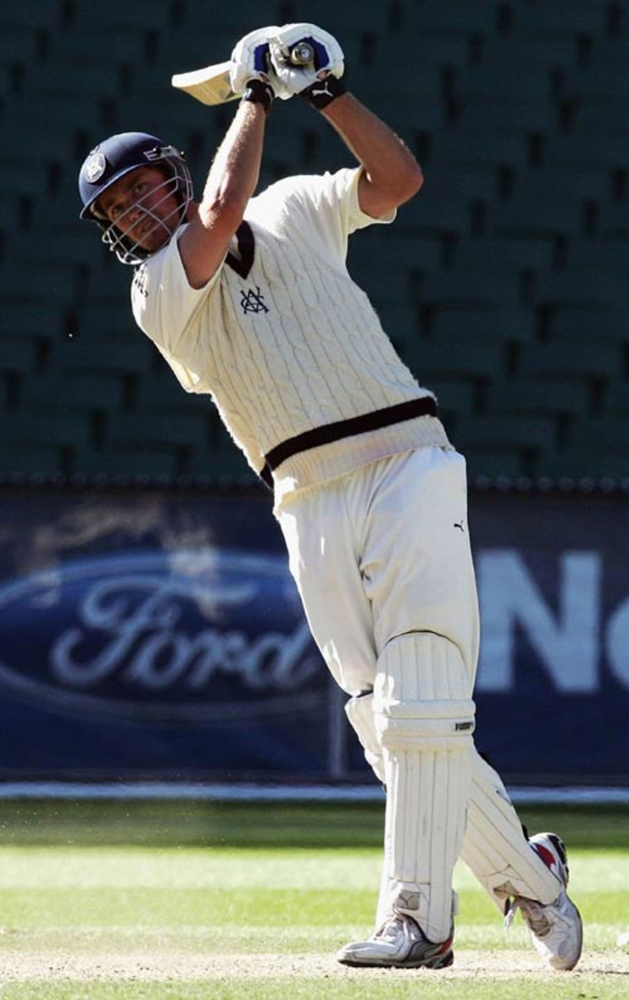 Nick Jewell of Victoria hits over mid-on during his hundred in the draw against Tasmania, Victoria v Tasmania, Pura Cup, Melbourne, 4th day, November 17, 2006