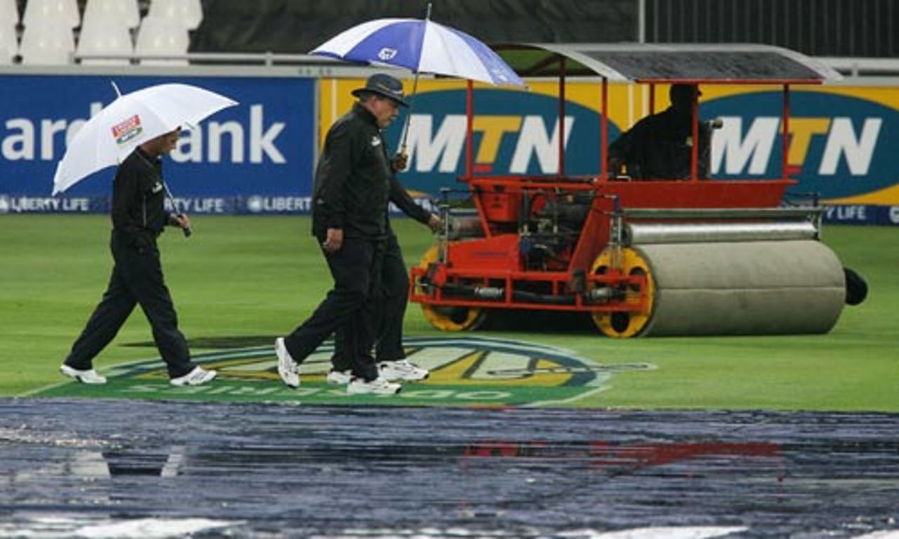 The umpires return after checking out the conditions, South Africa v India, 1st ODI, Johannesburg, November 19, 2006
