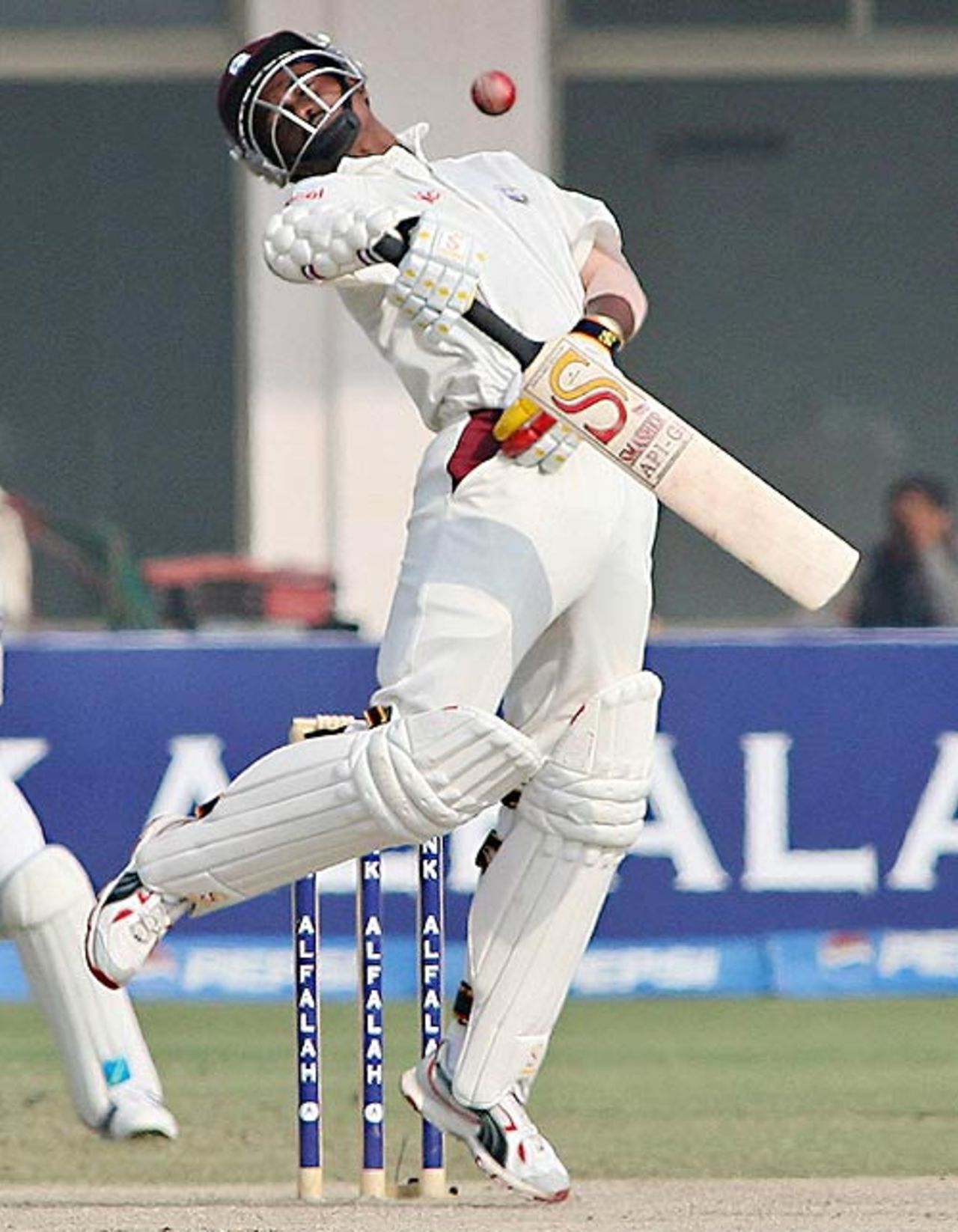 Dave Mohammed swerves out of the way of a bouncer, Pakistan v West Indies, 2nd Test, Multan, 4th day, November 22, 2006