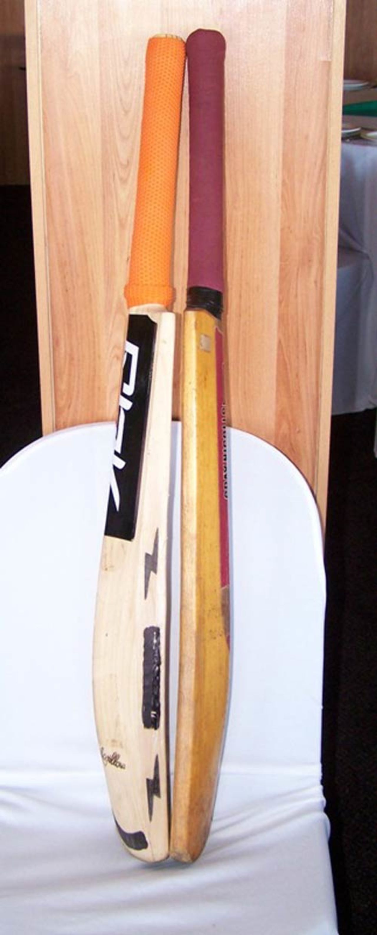 How the  new differs from the old.  Barry Richard's bat and Mahendra Singh Dhoni 's lie side by side, South Africa v India, 2nd ODI, Durban, November 22, 2006