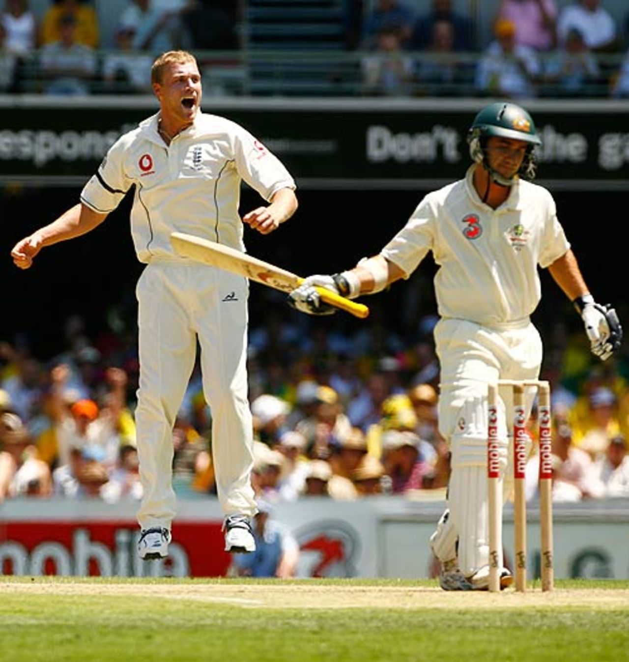 Andrew Flintoff jumps for joy after having Justin Langer caught at point, Australia v England, 1st Test, Brisbane, November 23, 2006