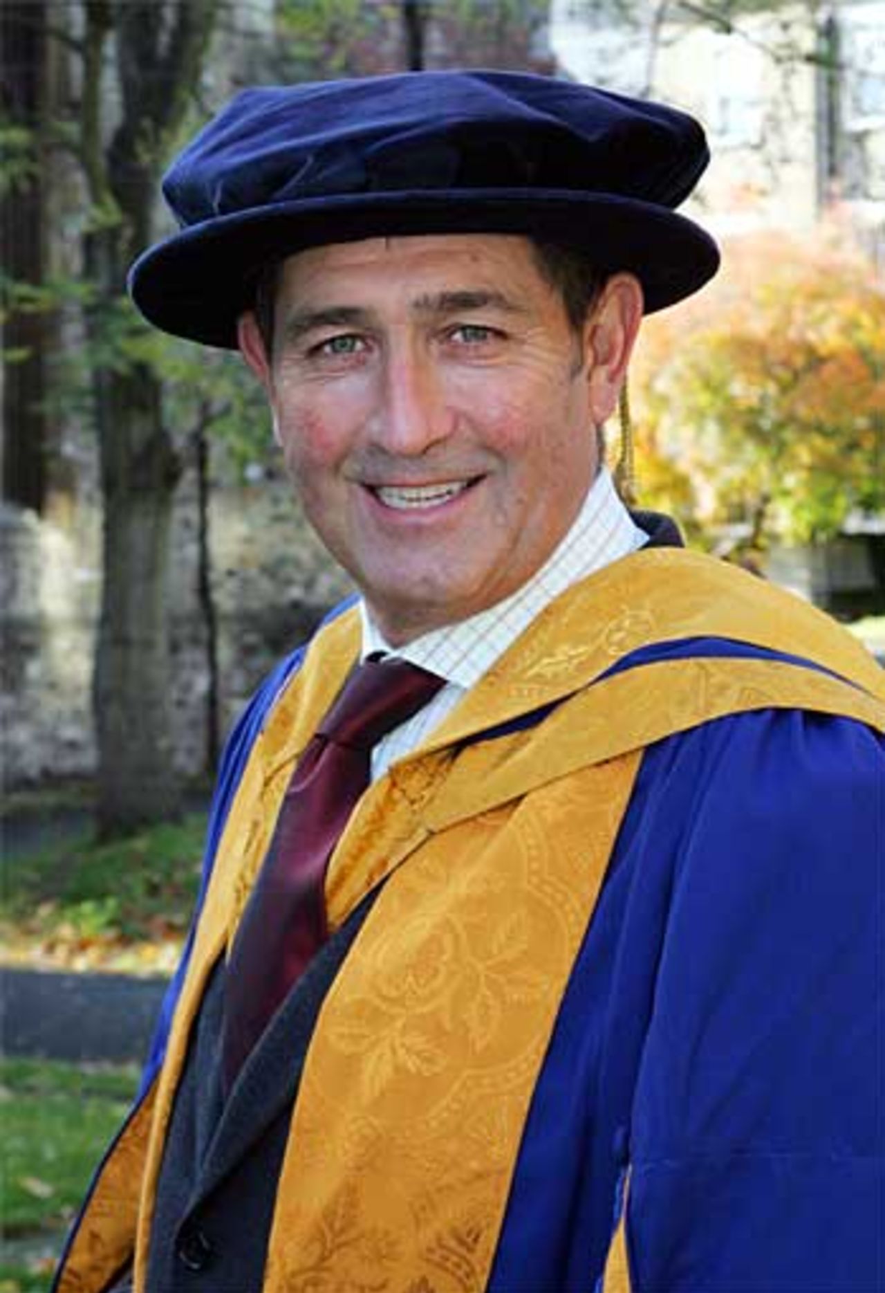 Graham Gooch is all smiles as he receives his honorary degree, November 23
