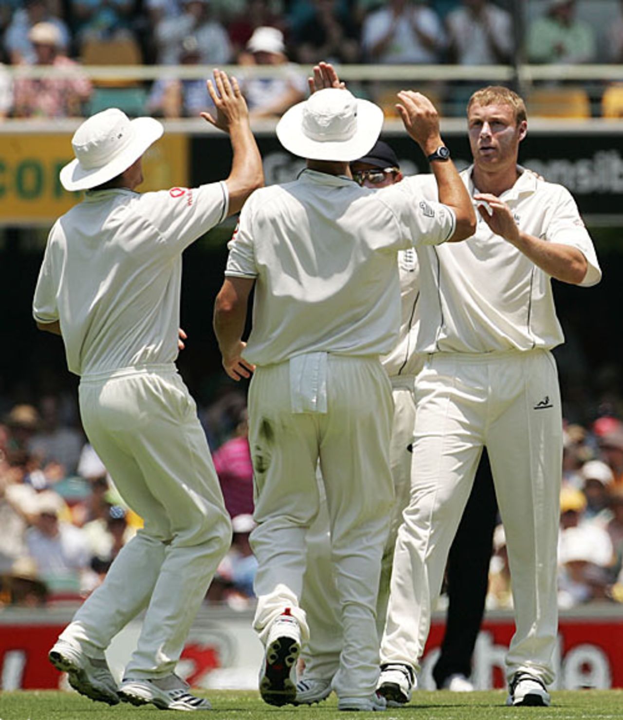 Andrew Flintoff is congratulated on removing Mike Hussey, Australia v England, 1st Test, Brisbane, November 24, 2006