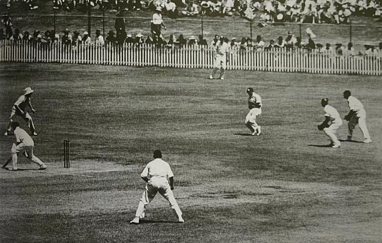Jack Ikin 'catches' Don Bradman in one of the Ashes' most controversial moments. The umpire ruled Bradman not out, to the dismay of the fielders, Australia v England, 1st Test, Brisbane, November 29, 1946