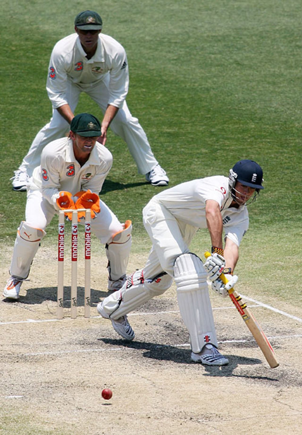 Alastair Cook nudges one to leg, watched by Adam Gilchrist and Matthew Hayden, Australia v England, 1st Test, Brisbane, November 26, 2006