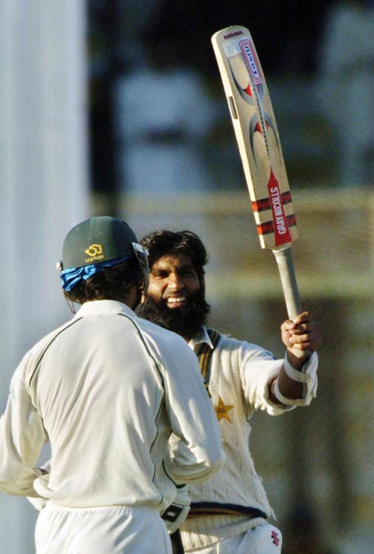 Mohammad Yousuf acknowledges the crowd after scoring a century, only the third batsman to run up a streak of five centuries in successive Tests, Pakistan v West Indies, 3rd Test, Karachi, 3rd day, November 27, 2006