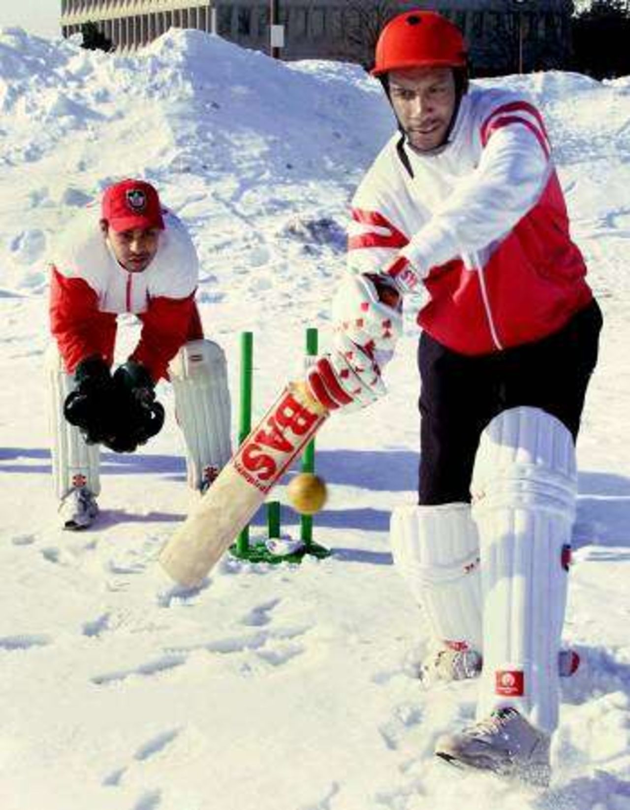 Davis Joseph and Ashish Bagai practice in adverse conditions in a photo call in Toronto prior to leaving for the World Cup