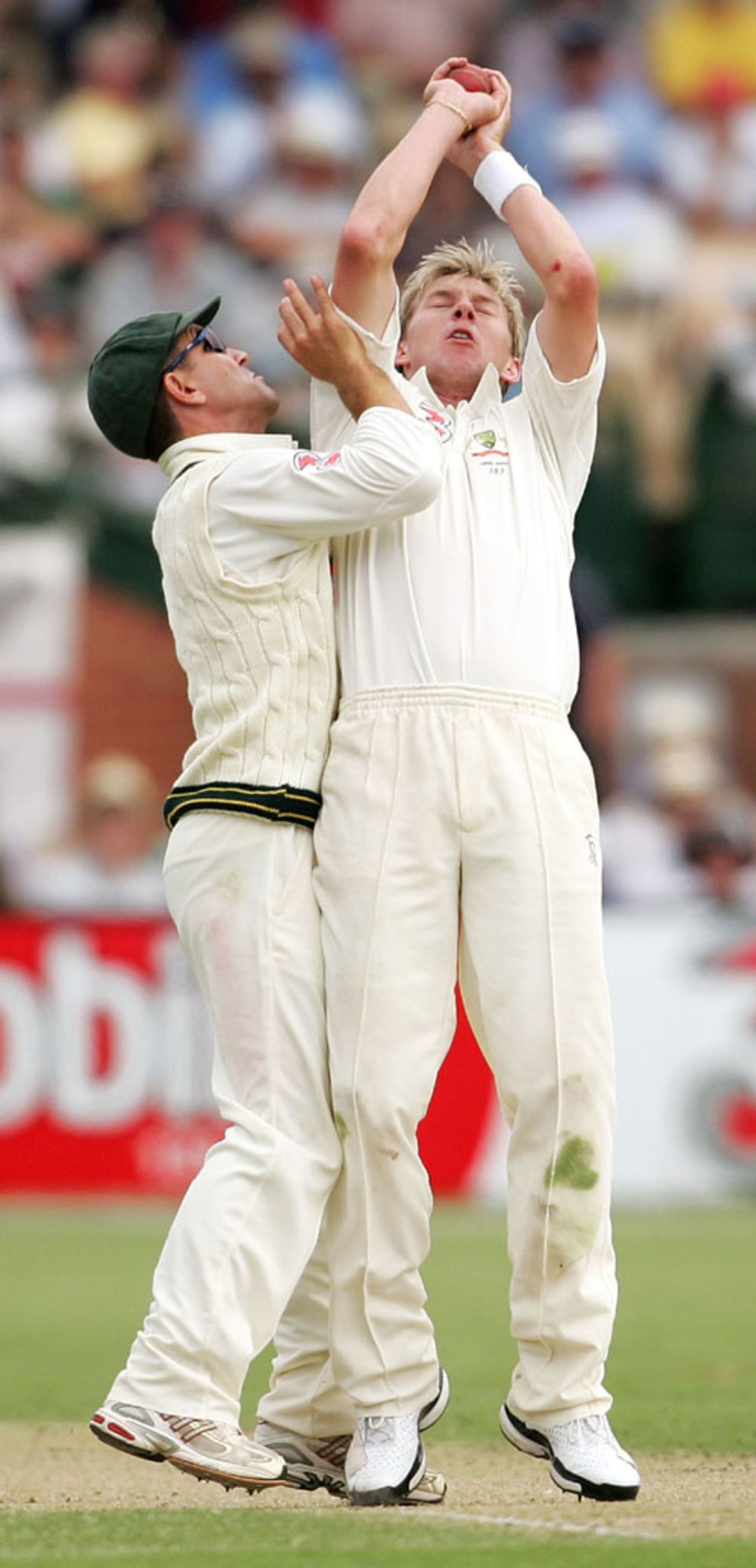 Brett Lee catches Ian Bell off his own bowling despite the best efforts of Justin Langer, Australia v England, 2nd Test, Adelaide, December 1, 2006