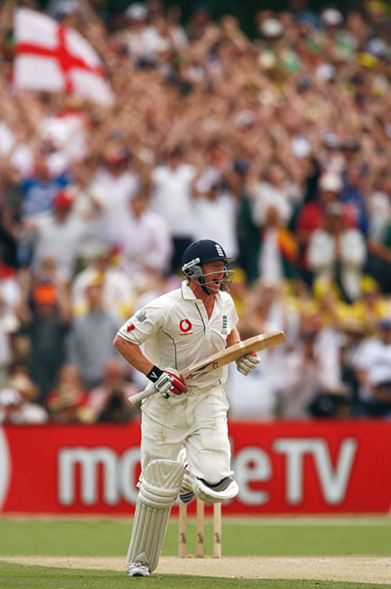 Paul Collingwood jogs through and brings up his hundred with the cross of St George in the background, Australia v England, 2nd Test, Adelaide, December 2, 2006