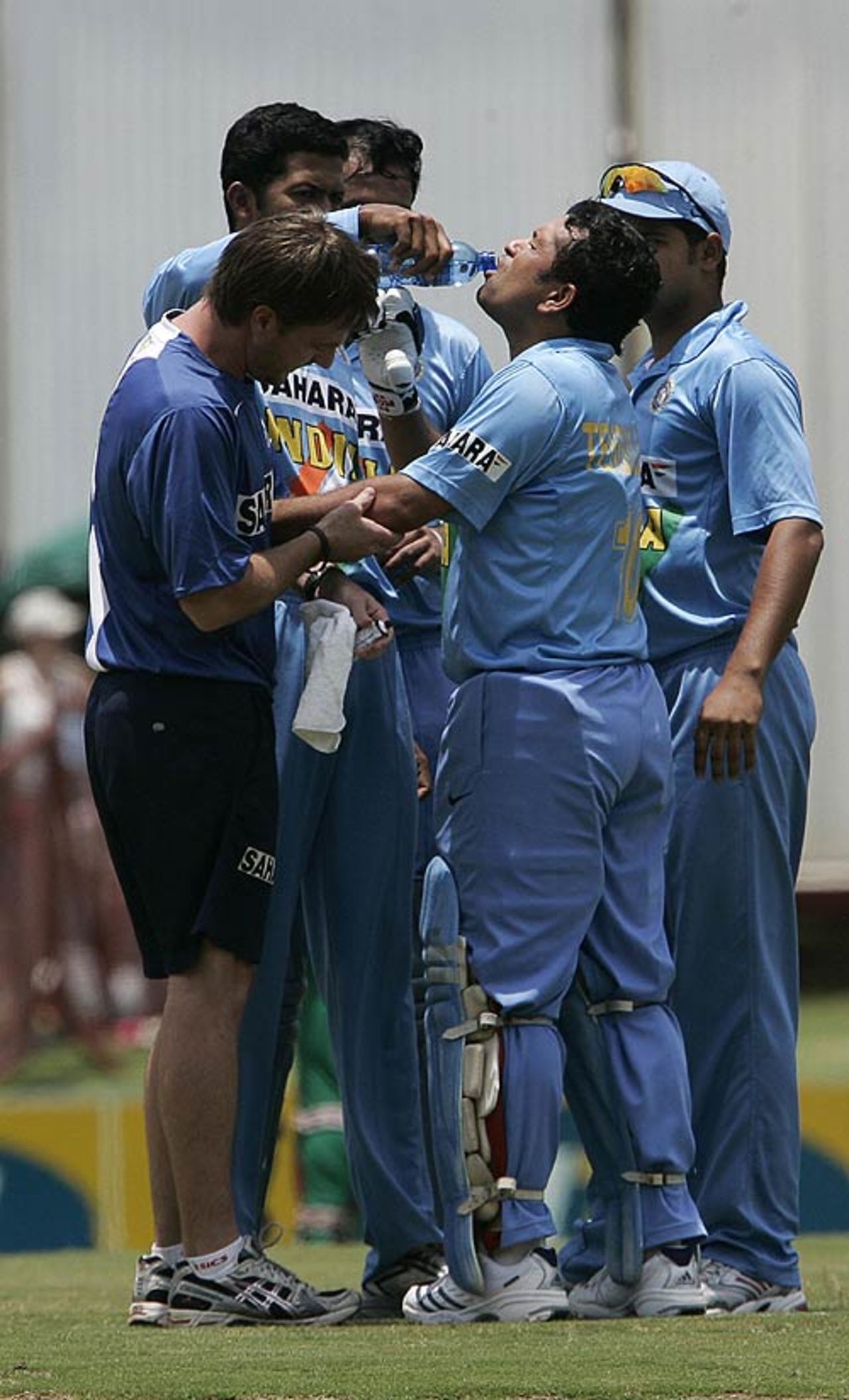 Sachin Tendulkar receives a drink and treatment for a bruised elbow, South Africa v India, 5th ODI, Centurion, December 3, 2006