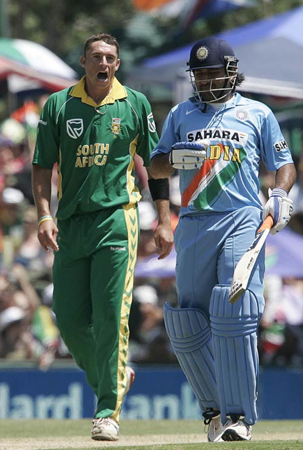 Andre Nel and Mahendra Singh Dhoni indulge in banter during India's innings, South Africa v India, 5th ODI, Centurion, December 3, 2006