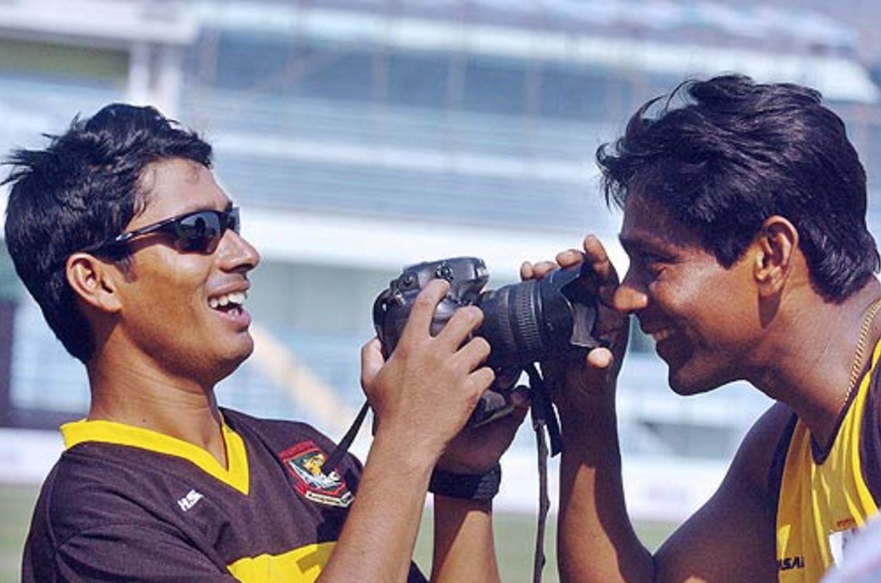 A 'Kodak Moment' for Mohammad Ashraful and Mohammad Rafique, Mirpur, December 7, 2006
