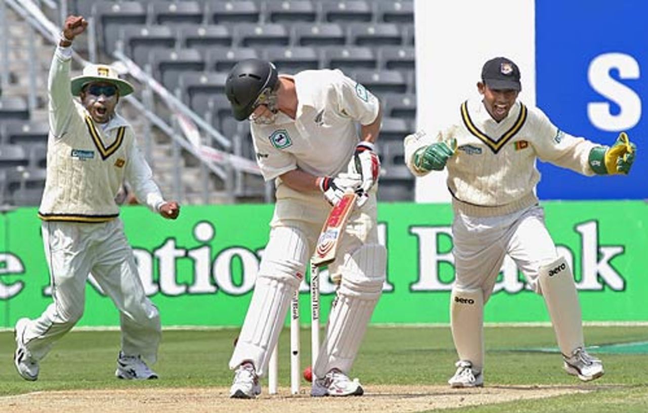 The Sri Lankans celebrate Craig Cumming's wicket, New Zealand v Sri Lanka, 1st Test, Christchurch, 2nd day, December 8, 2006