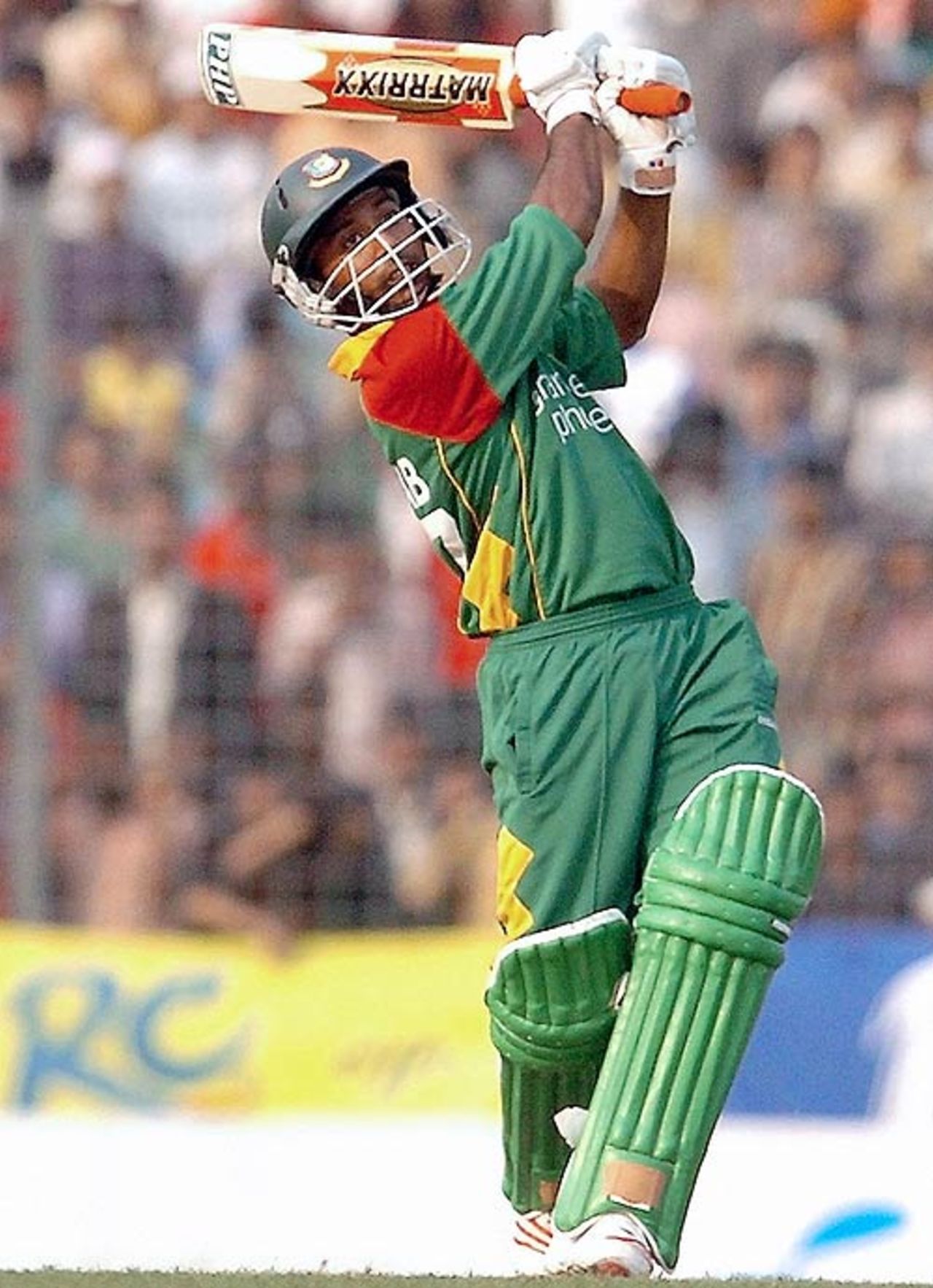 Aftab Ahmed lofts en route to his match-winning 58, Bangladesh v Zimbabwe, 4th ODI, Dhaka, December 8, 2006